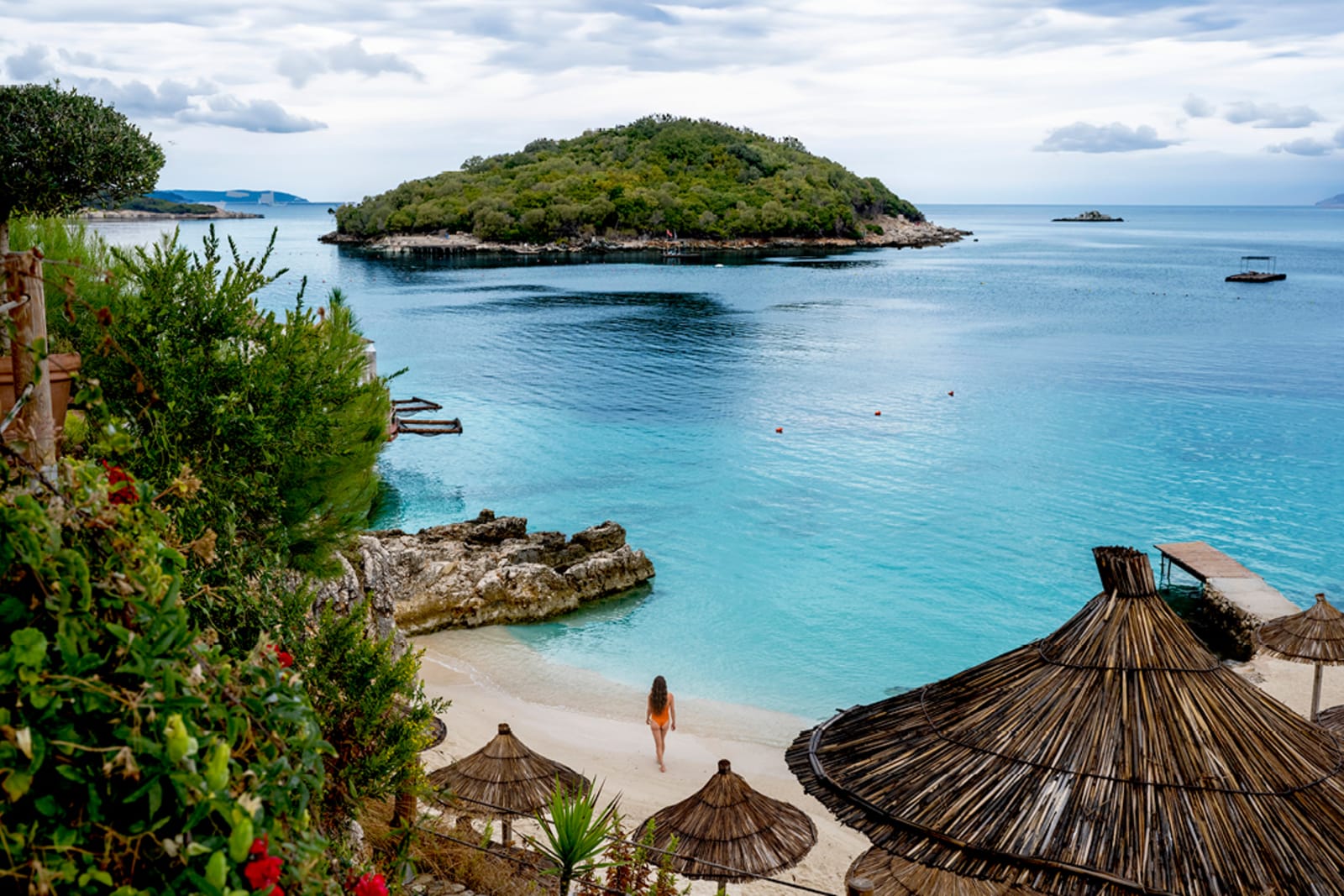 A woman at a luxury beach resort in Ksamil, Albania