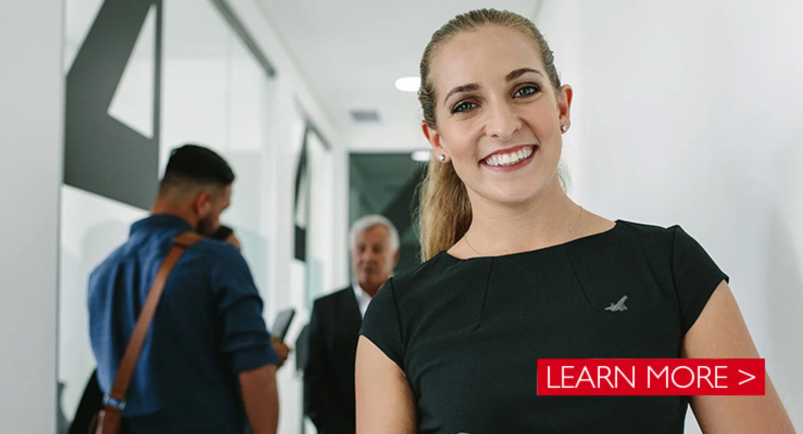 Closeup of a Businesswoman wearing a Flight Centre Badge