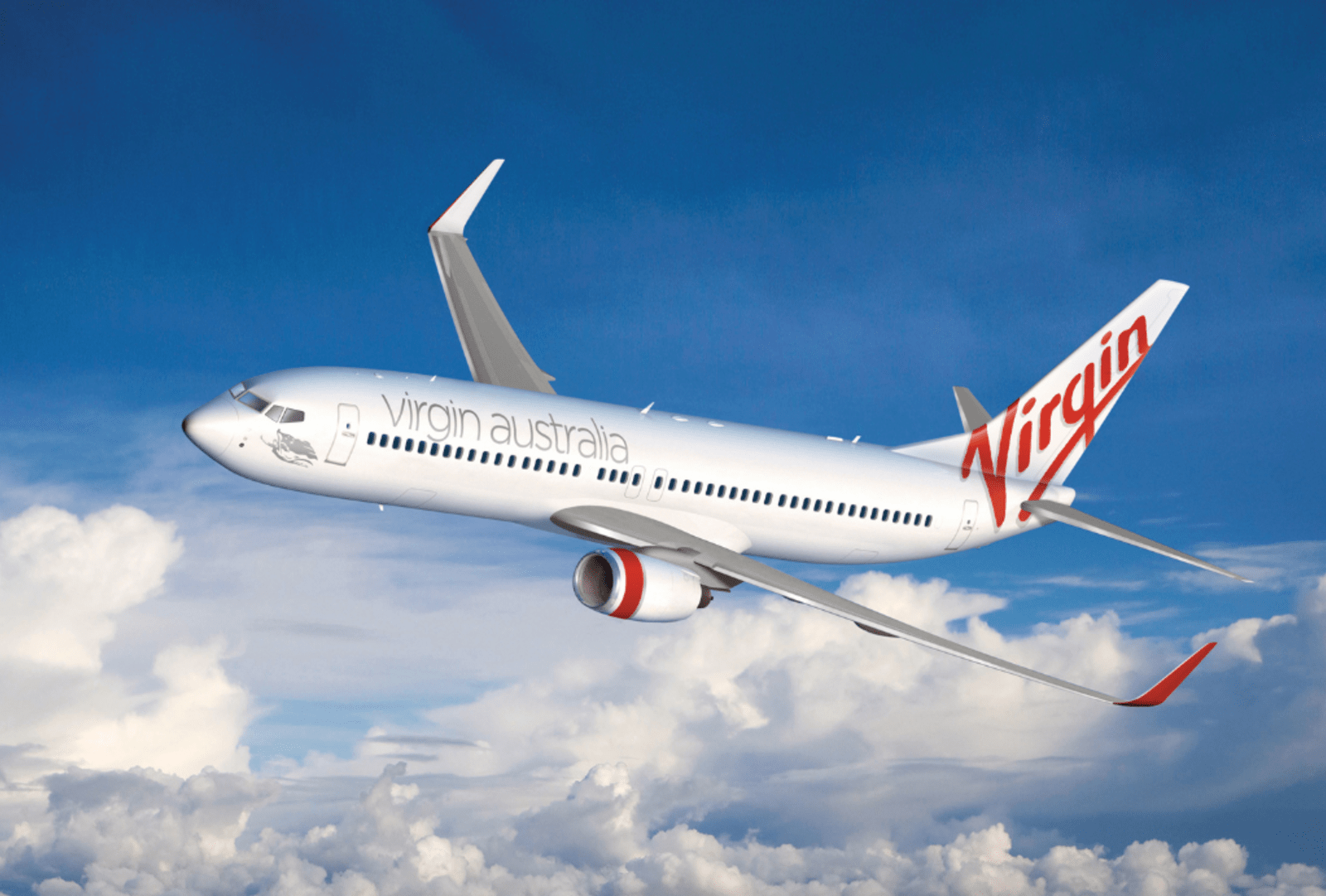 A Virgin Airlines 737-800 plane soars above the clouds
