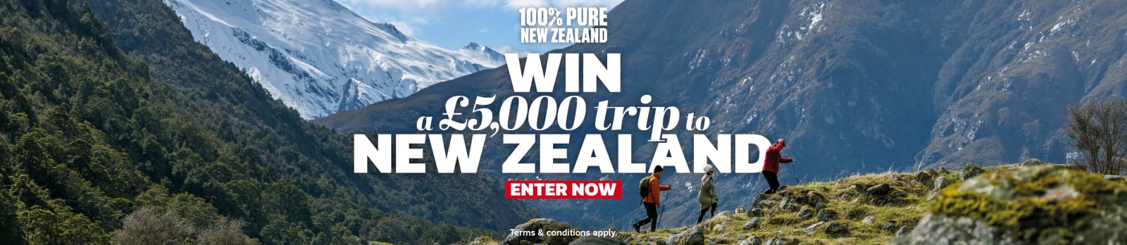 Three people hiking over rocky mountains featuring a chance to win a £5,000 trip to New Zealand