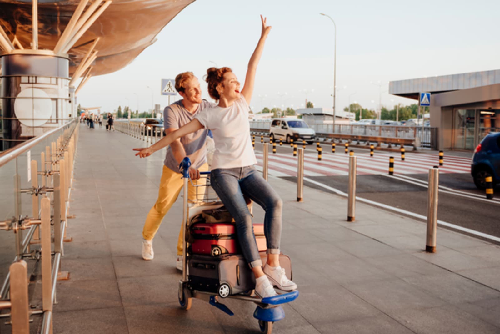 Happy couple with their luggage