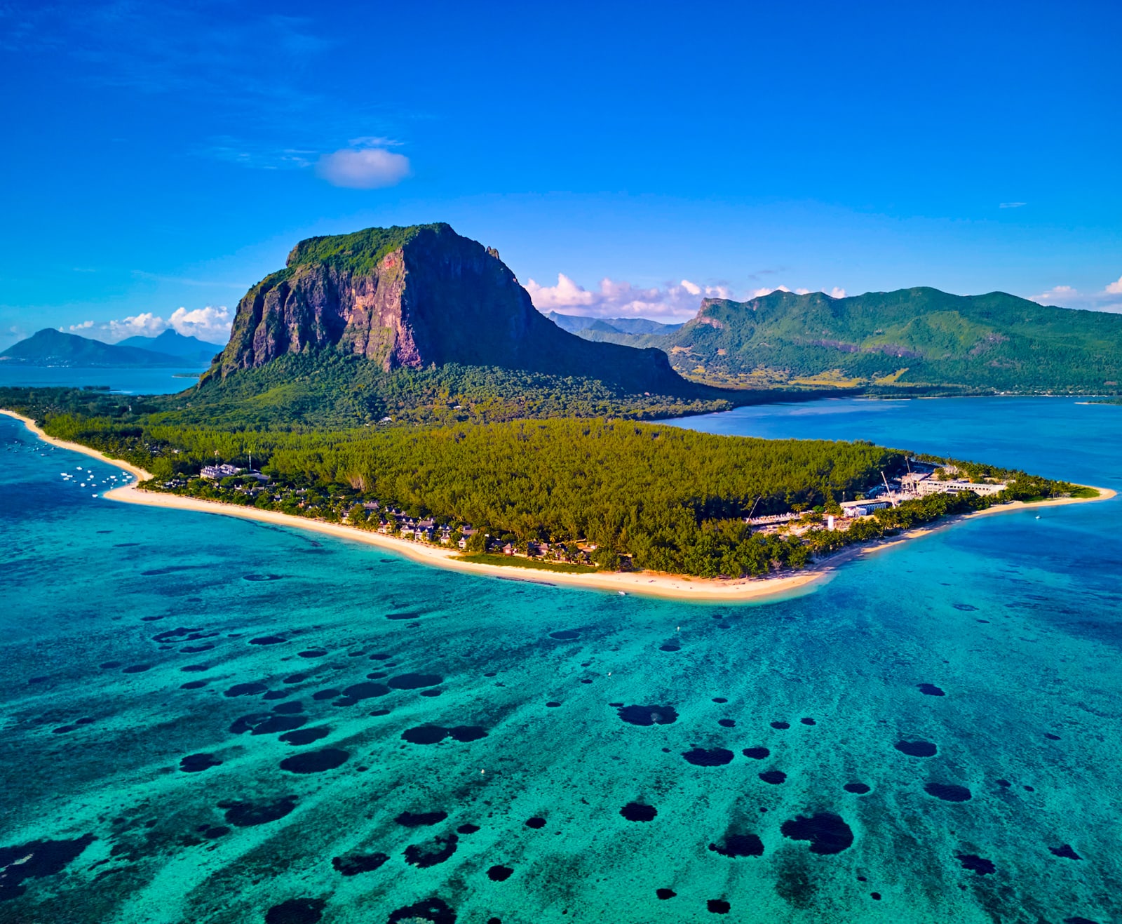 Island surrounded by clear water