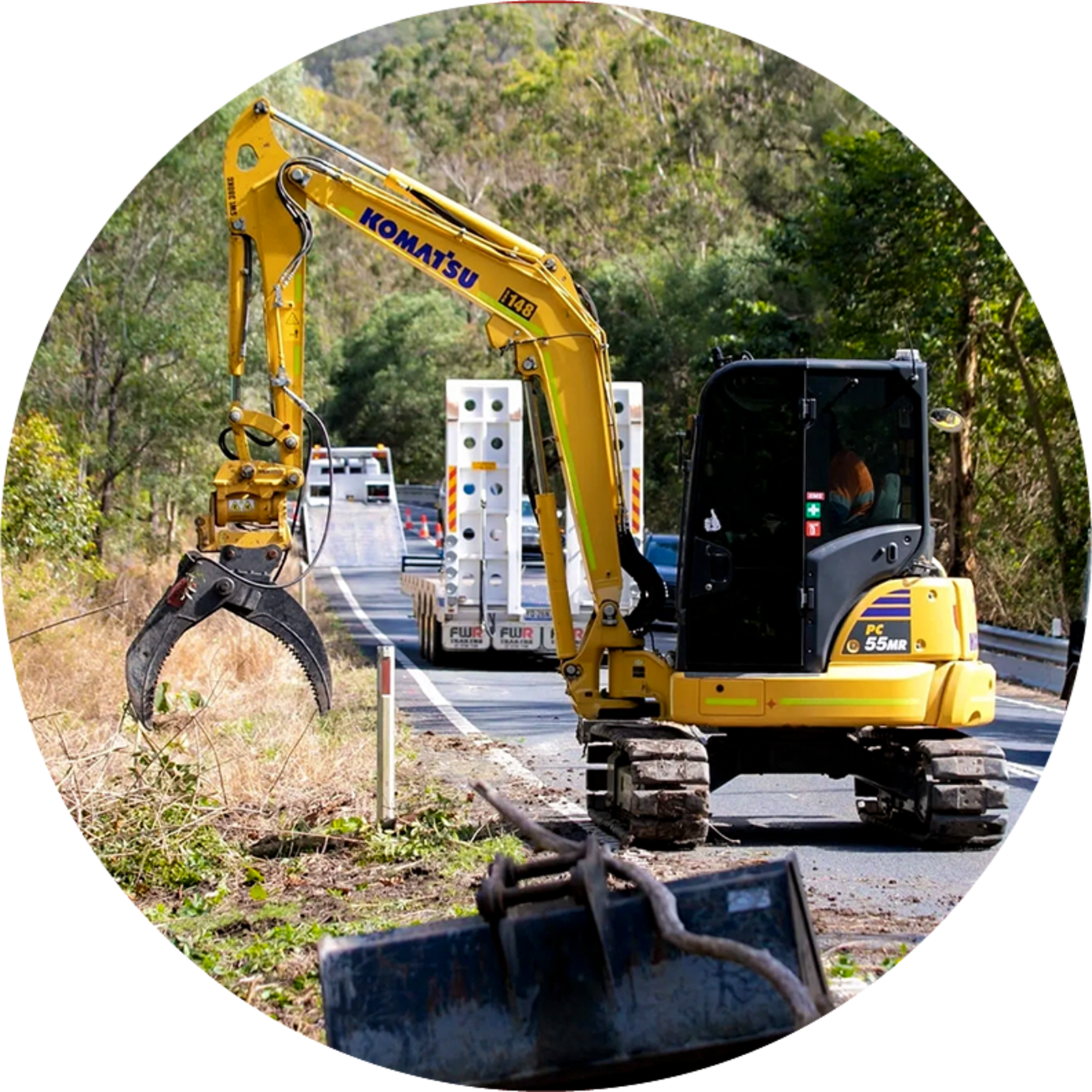 Yellow construction vehicle on a road