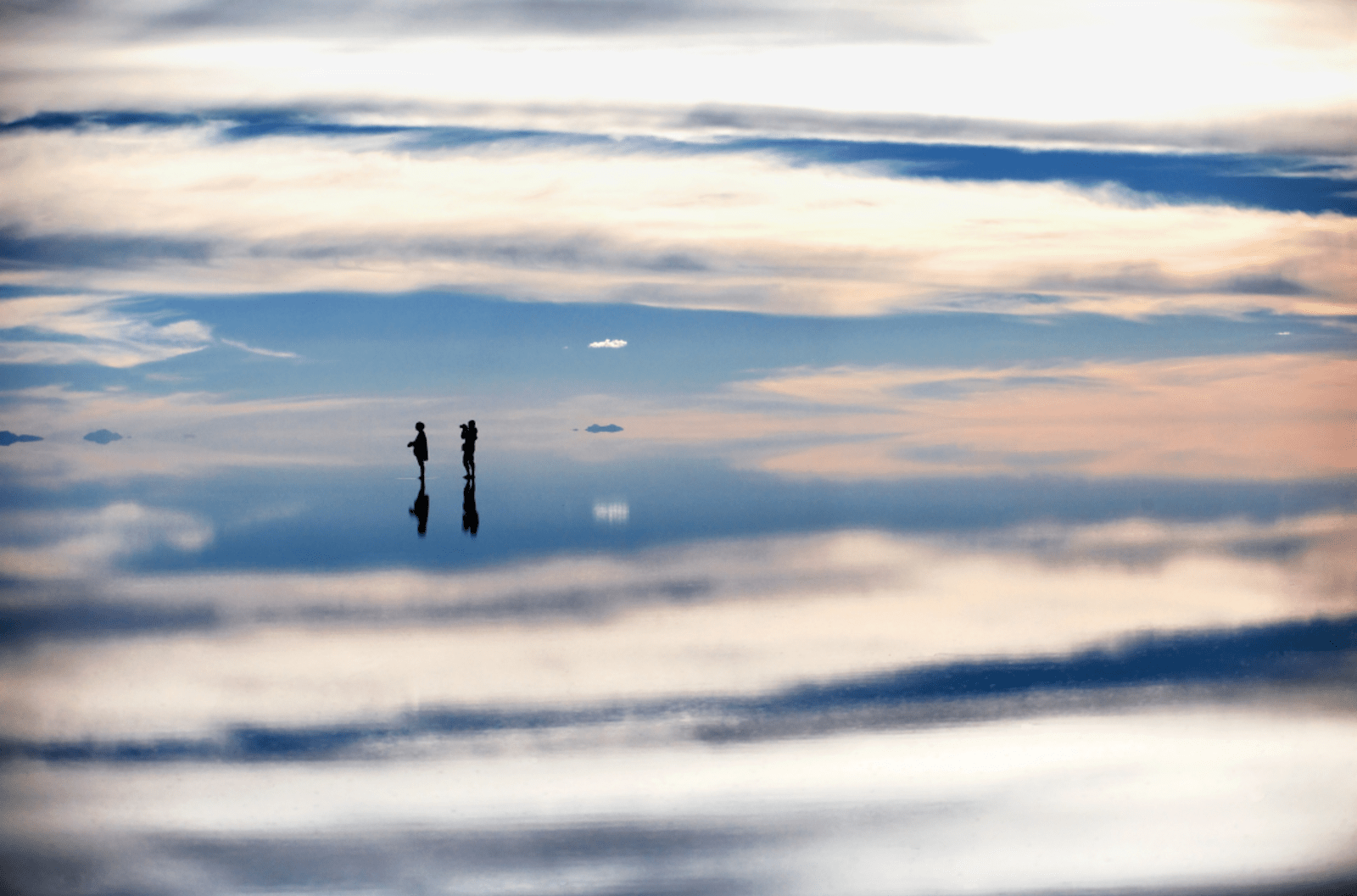 The mirror-like salt flats of Salar de Uyuni in Bolivia.
