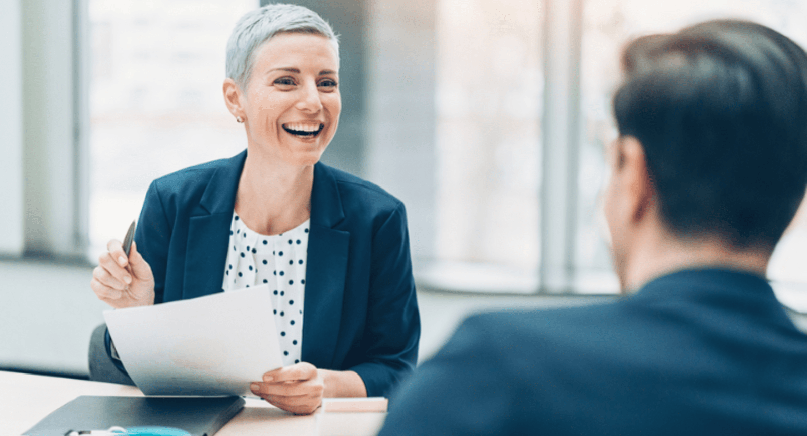 Two business people having a meeting