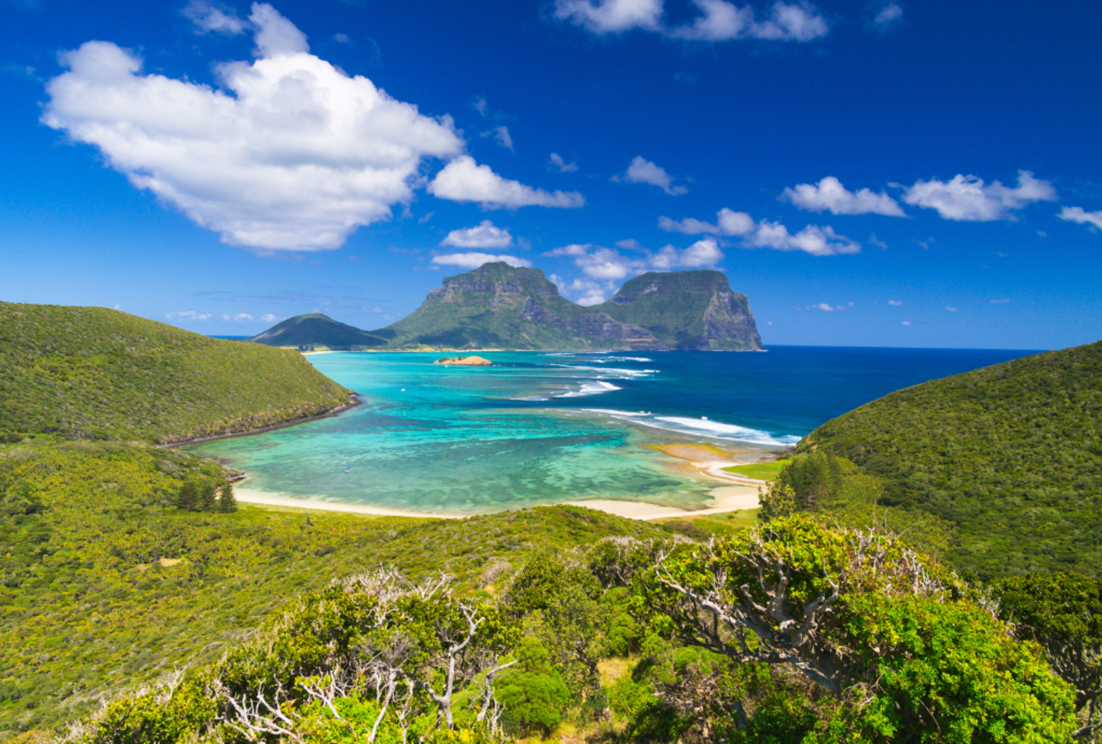 View south over lagoon to Mt Lidgbird and Mt Gower, with heart-shaped cloud overhead on Lord Howe Island