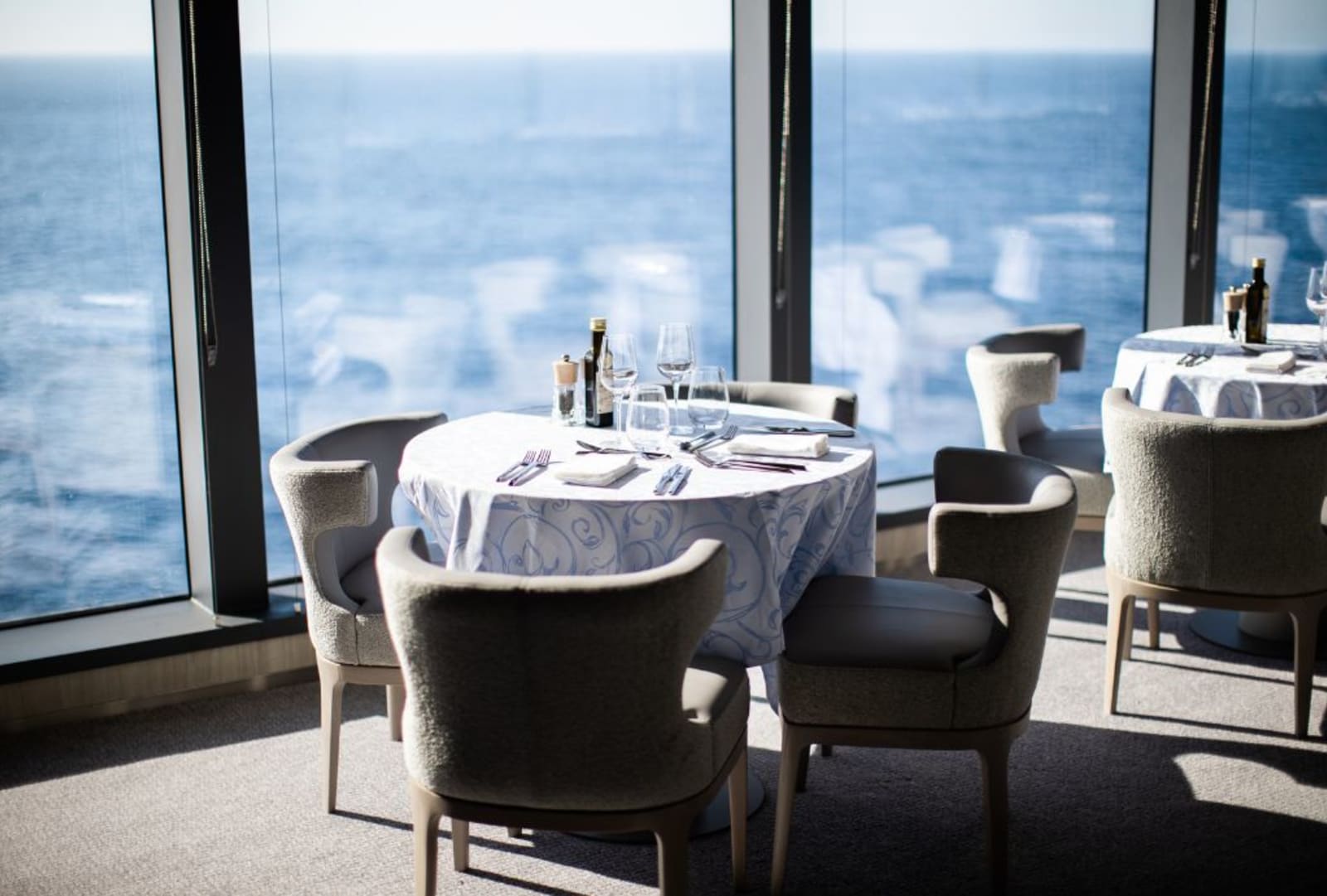 A table overlooking the sea on a cruise ship
