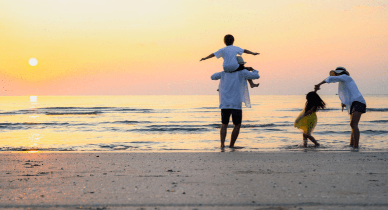 Family on holiday at the beach