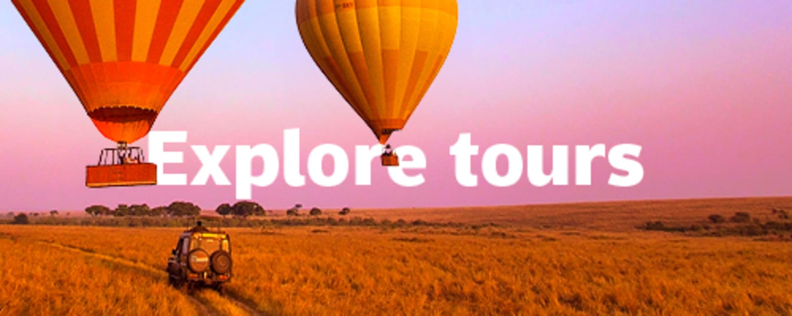 Hot air balloons rising over a golden savanna with a safari vehicle below for Explore tours