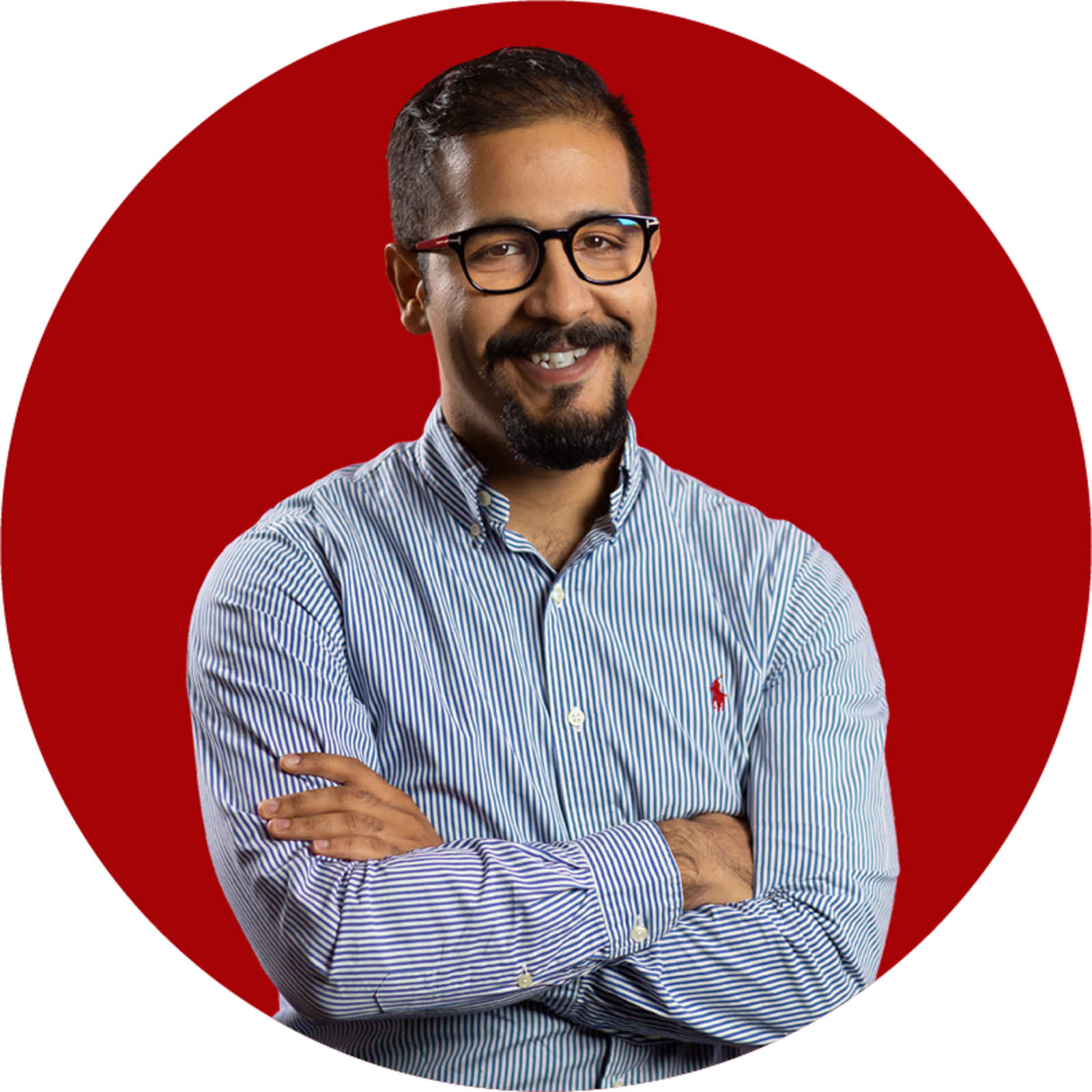 Bearded Indian man in front of a red circle background