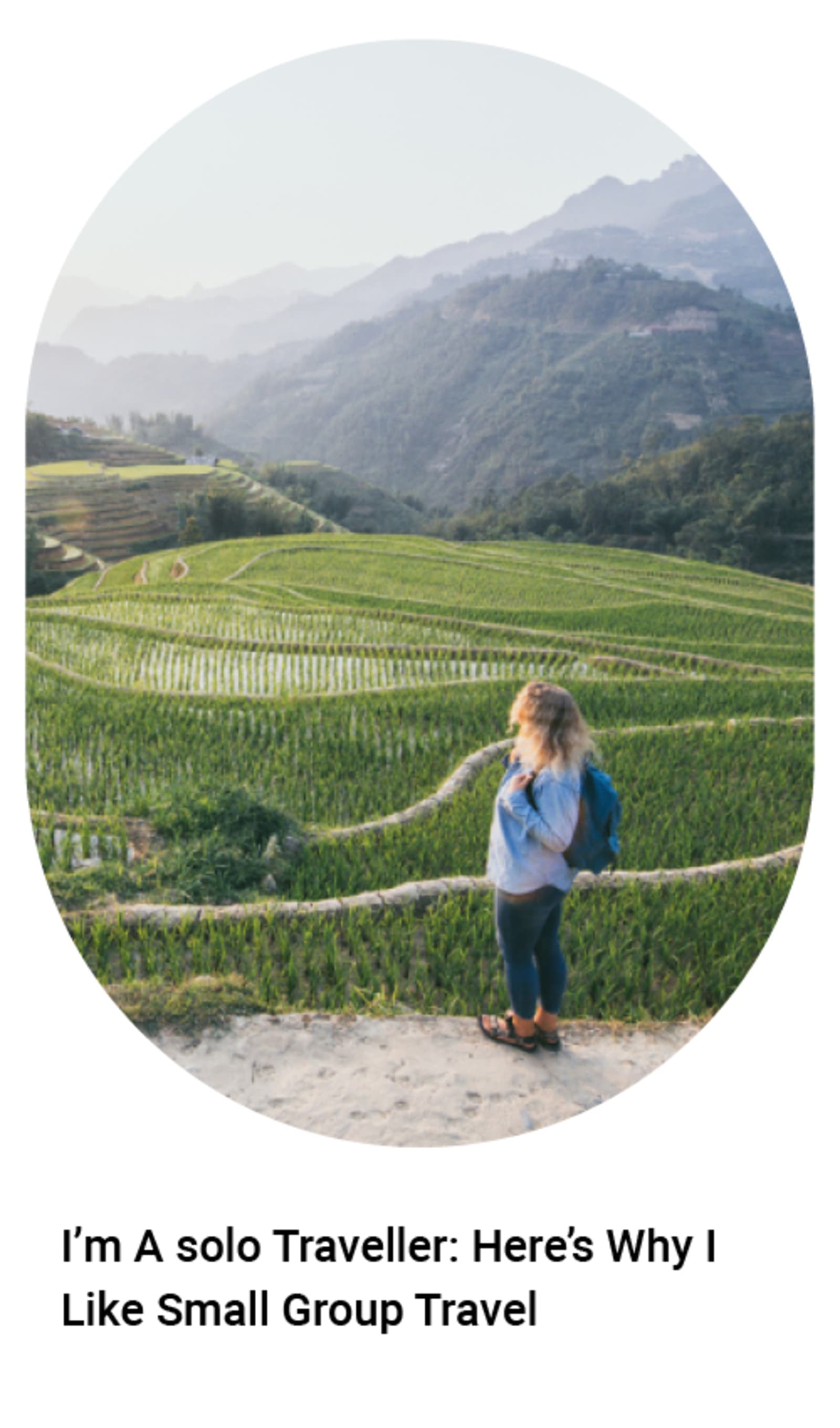 Woman backpacker looking out at terraced fields - I'm a solo traveller: here's why I like small group travel
