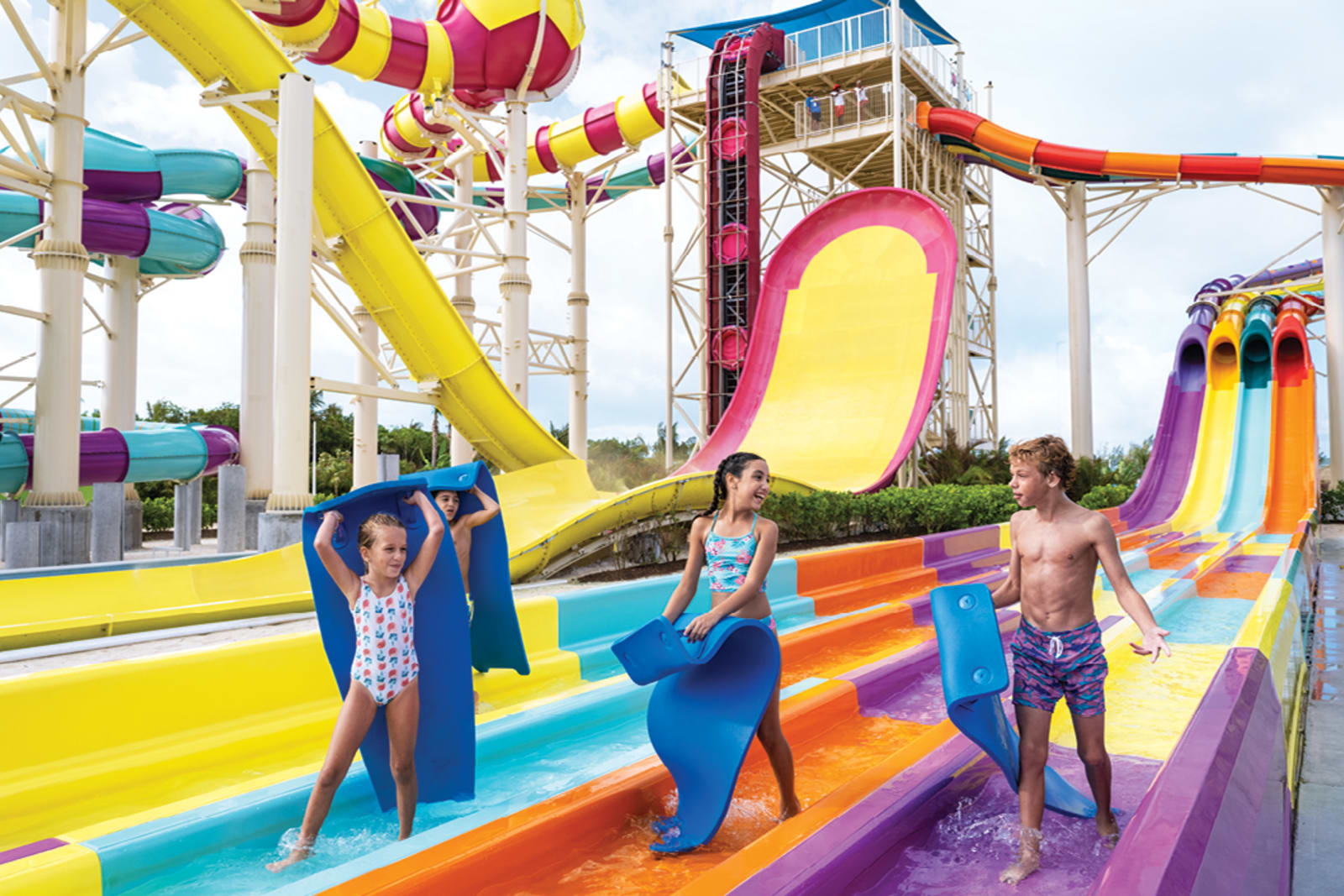Kids playing on the water slides at CocoCay, Royal Caribbean International's private island
