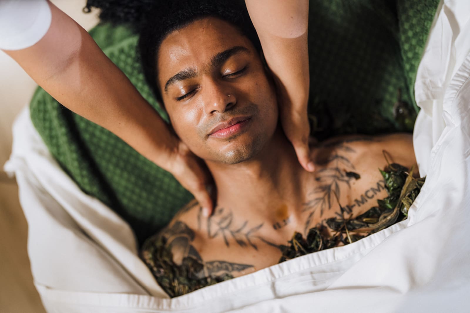Person getting a massage at a Los Cabos spa