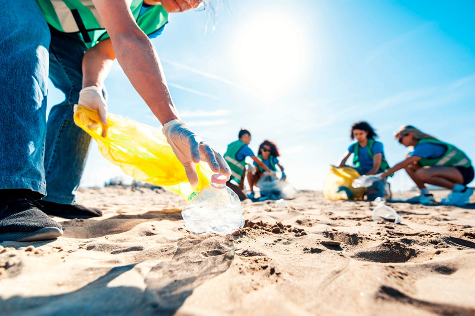 Volunteers cleaning a beach