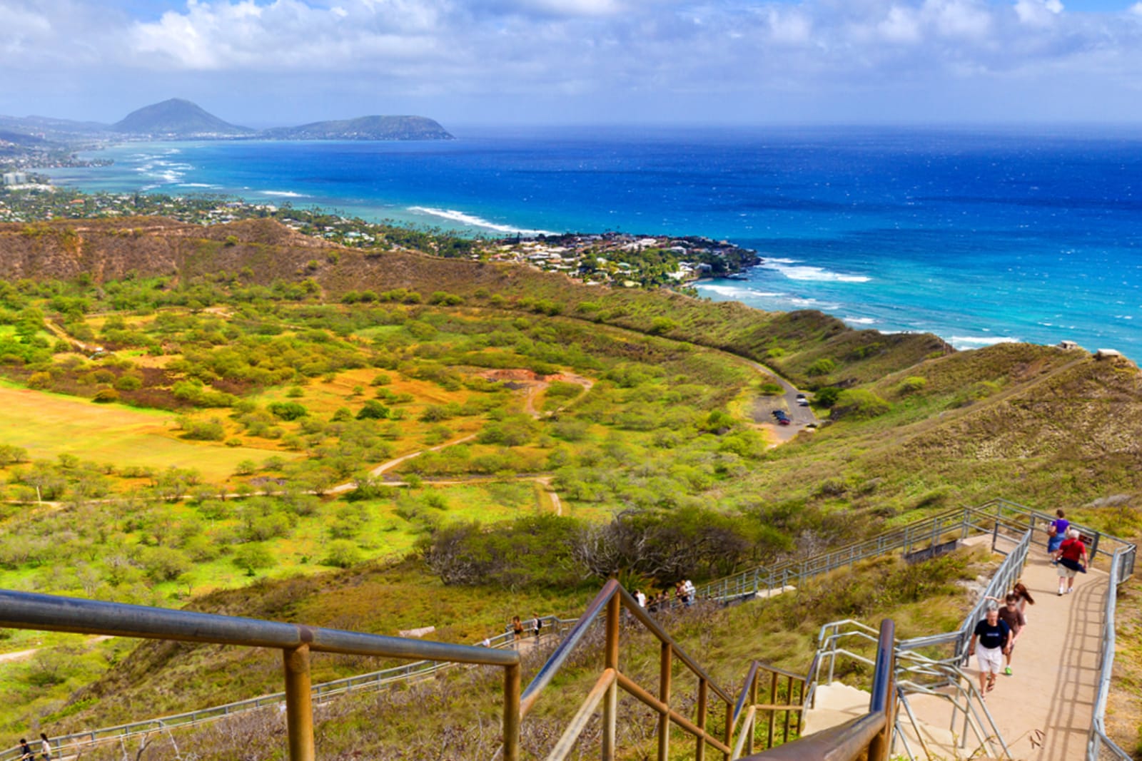 Travellers hiking up the Diamond Head crater in Honolulu