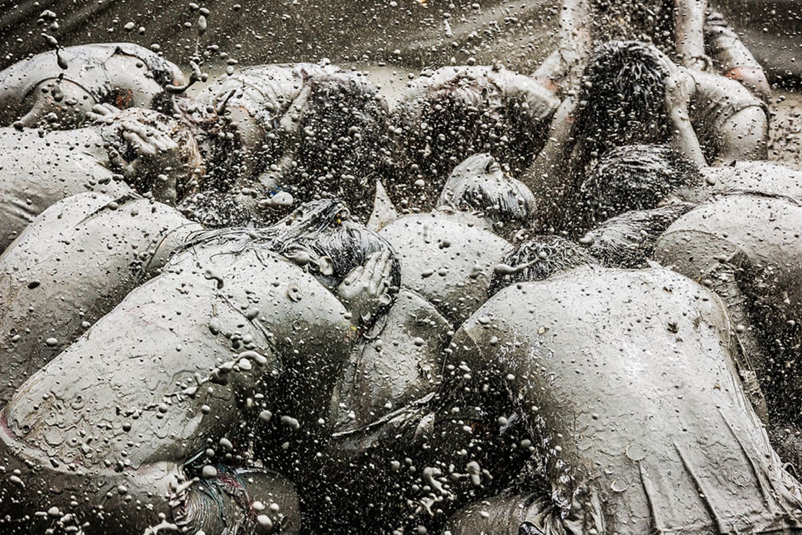 A group of people at the Boryeong Mud Festival in South Korea