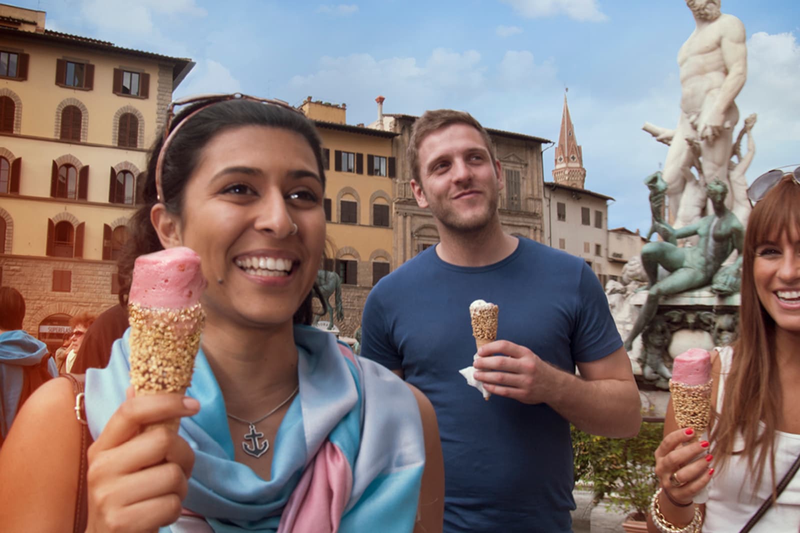 A group of tourists enjoying ice cream in Italy