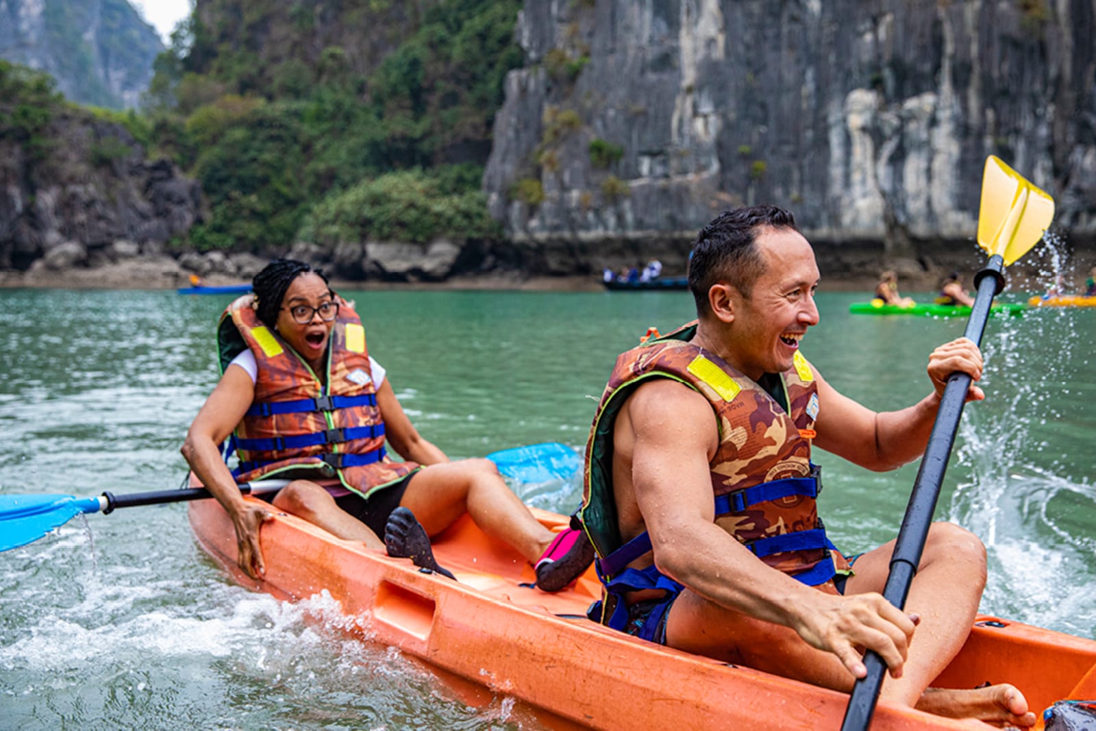 A couple of individuals kayaking in Vietnam