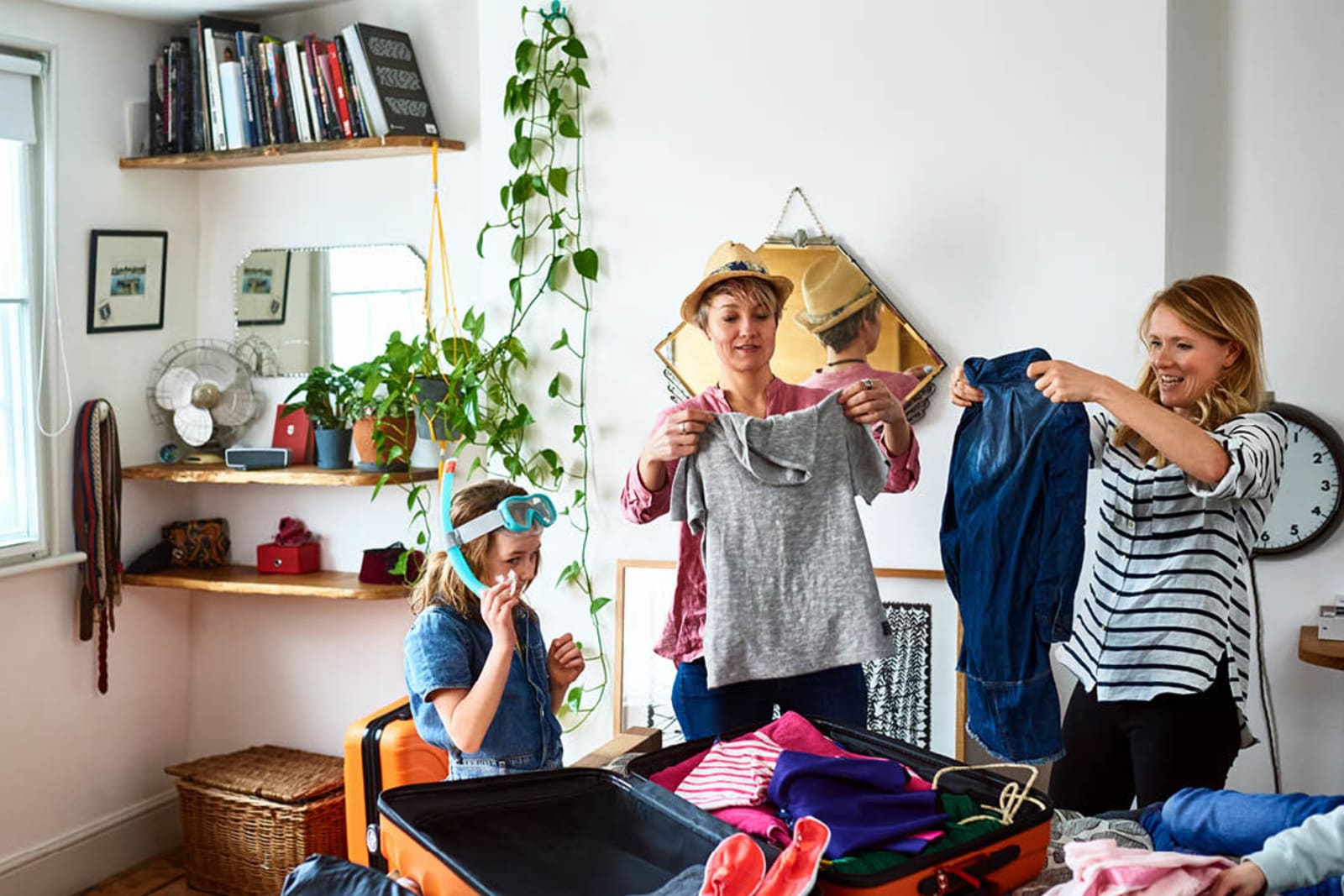 A family packing for an upcoming vacation