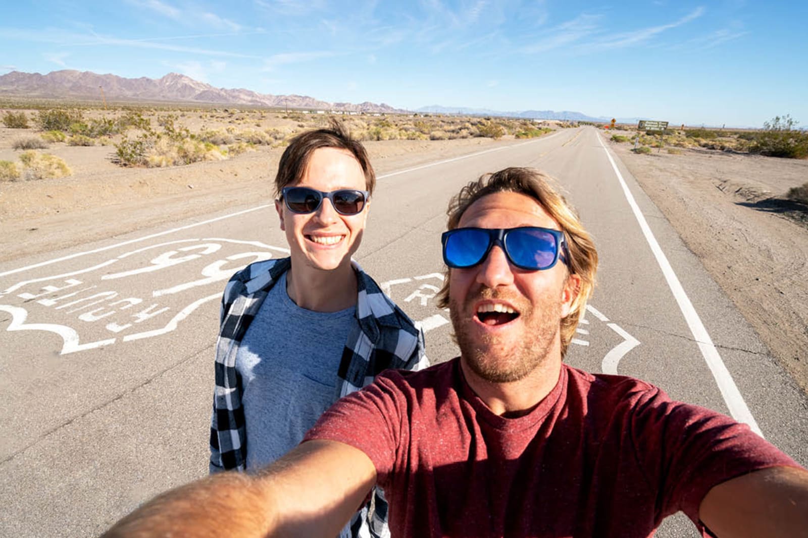 Two people taking a selfie on Route 66 in Arizona
