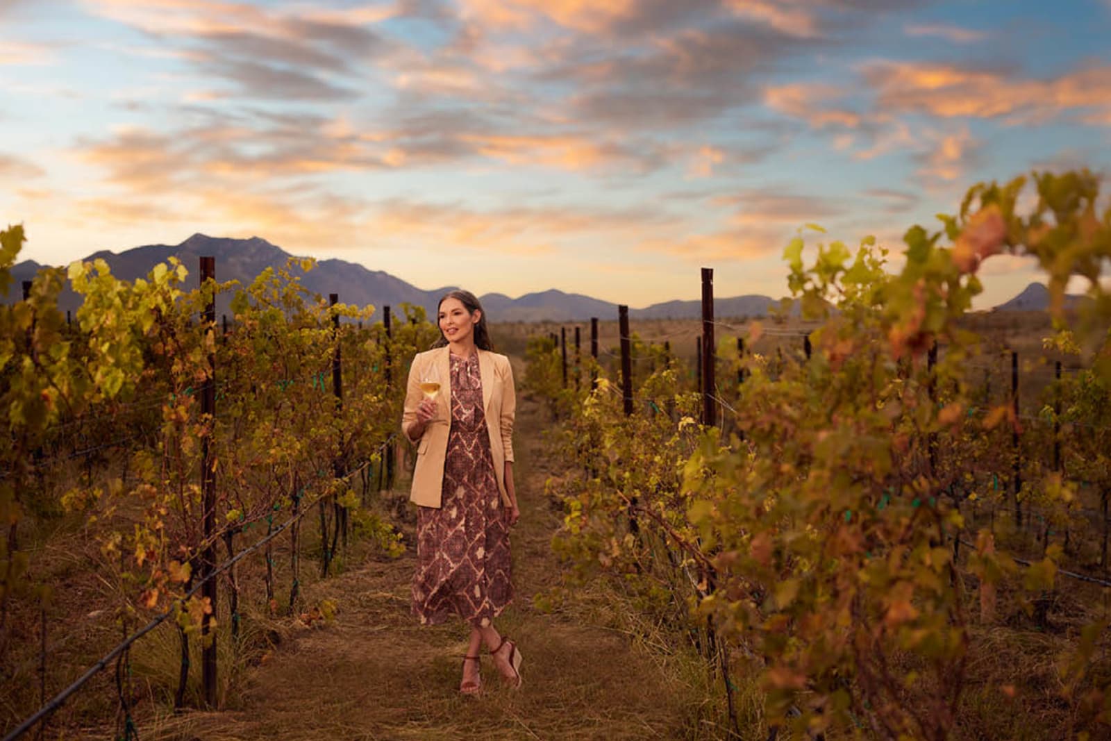 A woman enjoying wine in a winery in Sedona