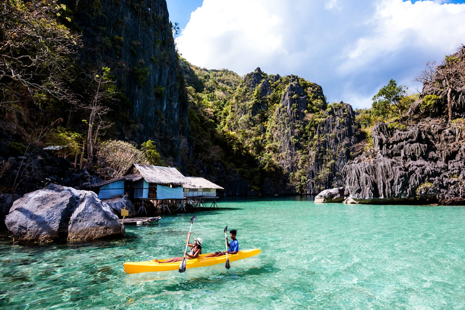 A couple kayaking in the Philippines
