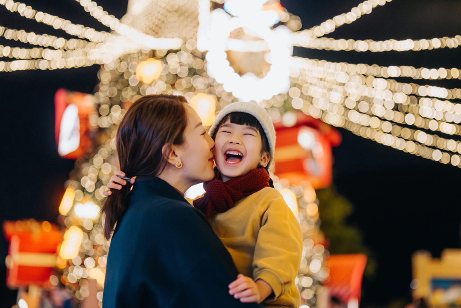 Mother and daughter at a Christmas market
