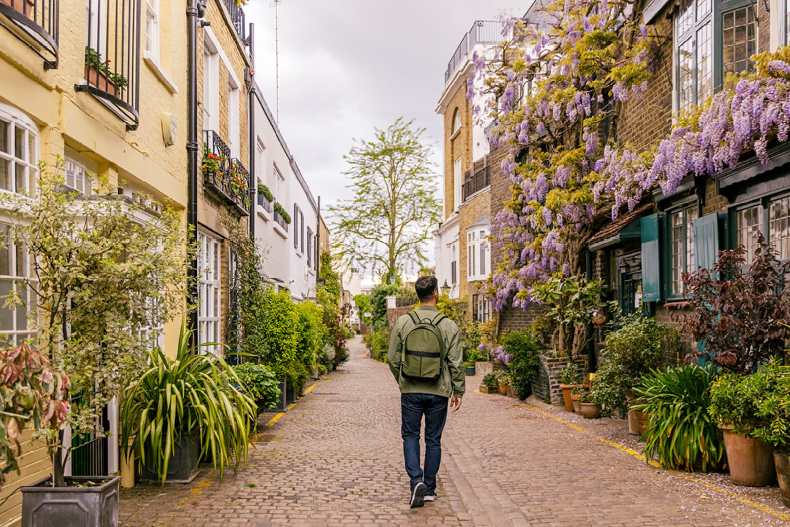 Traveller walking in the South Kensington neighbourhood in London, England