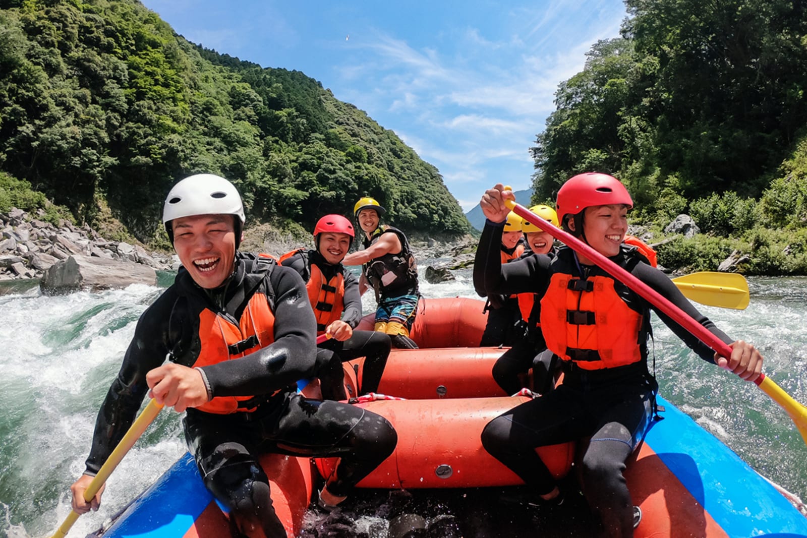 A group white water rafting on a cruise shore excursion