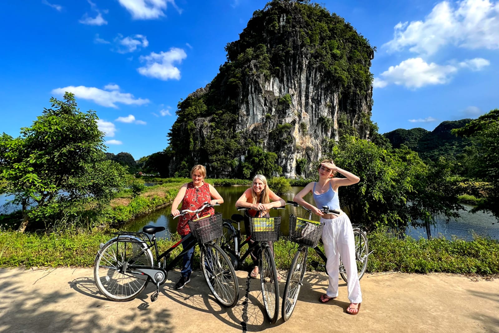 Travellers enjoying cycling activity on tour