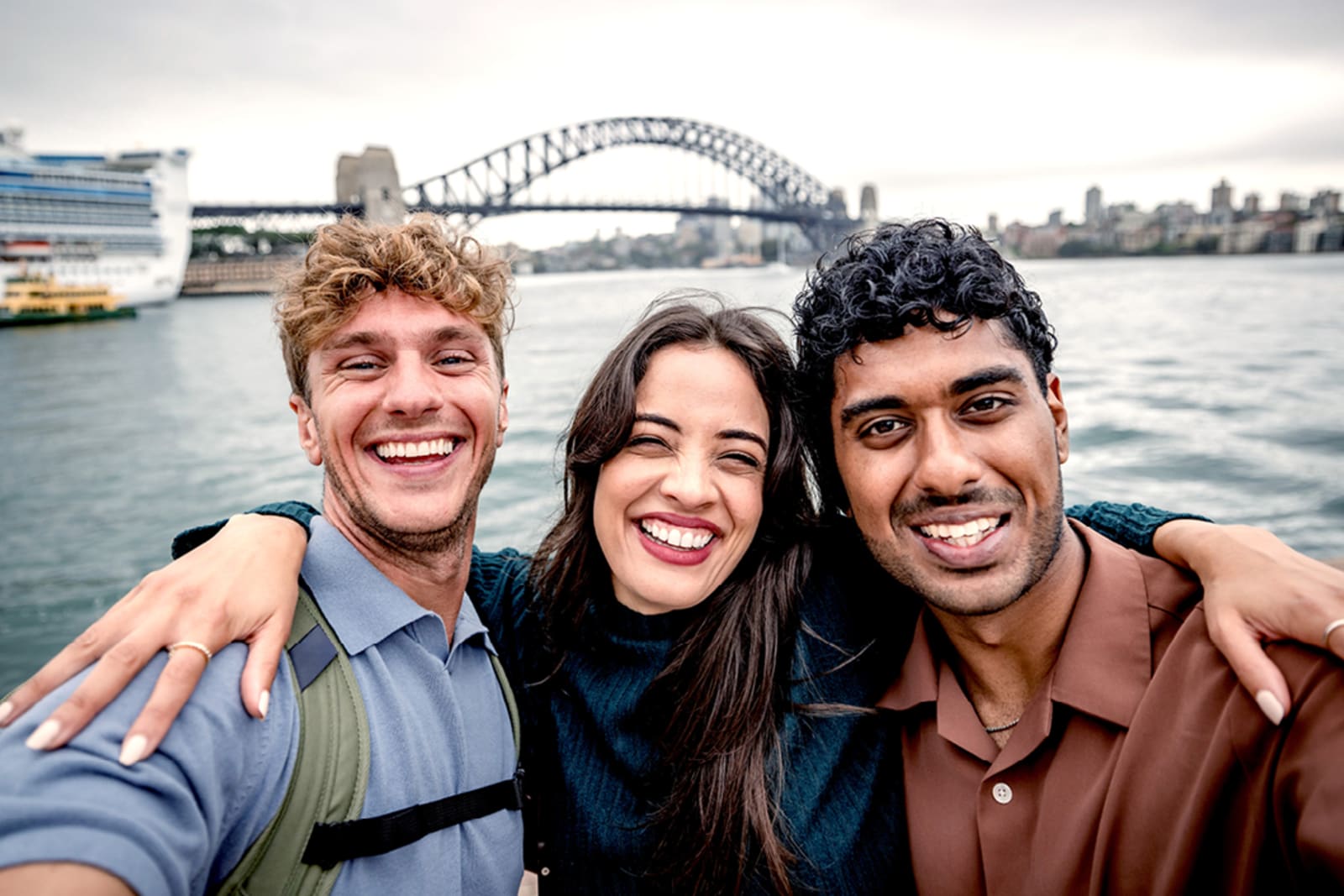 Travellers taking a selfie in Sydney Harbour