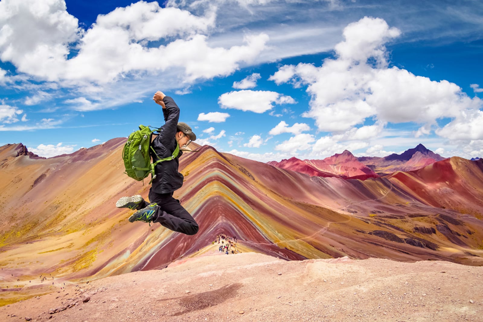 Traveller at Vinicunca (aka Rainbow Mountain) in Peru