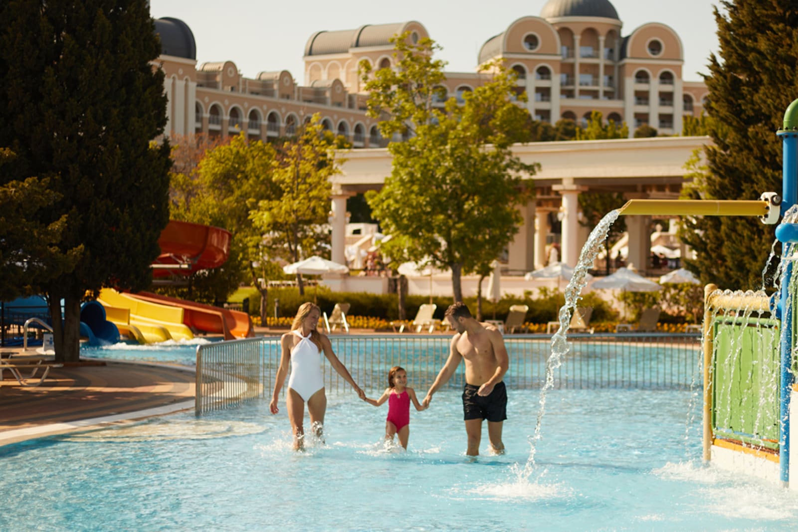 Young family at an all-inclusive resort in Mexico