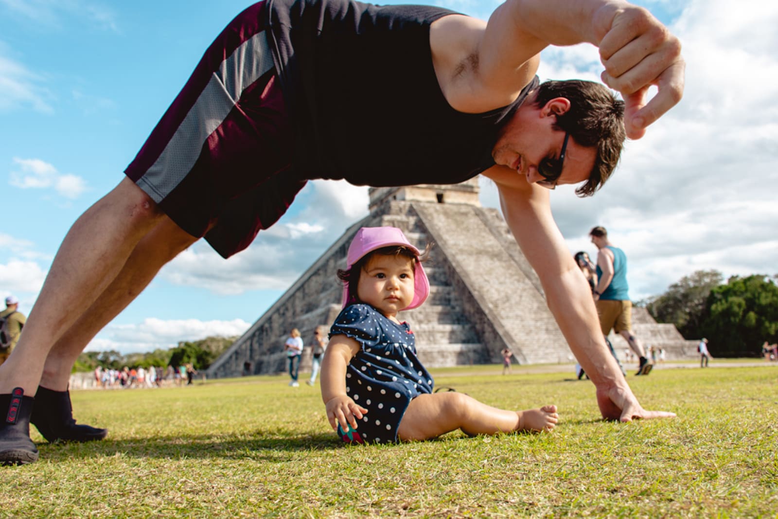 Dad and infant daughter at Chichén Itzá in Mexico
