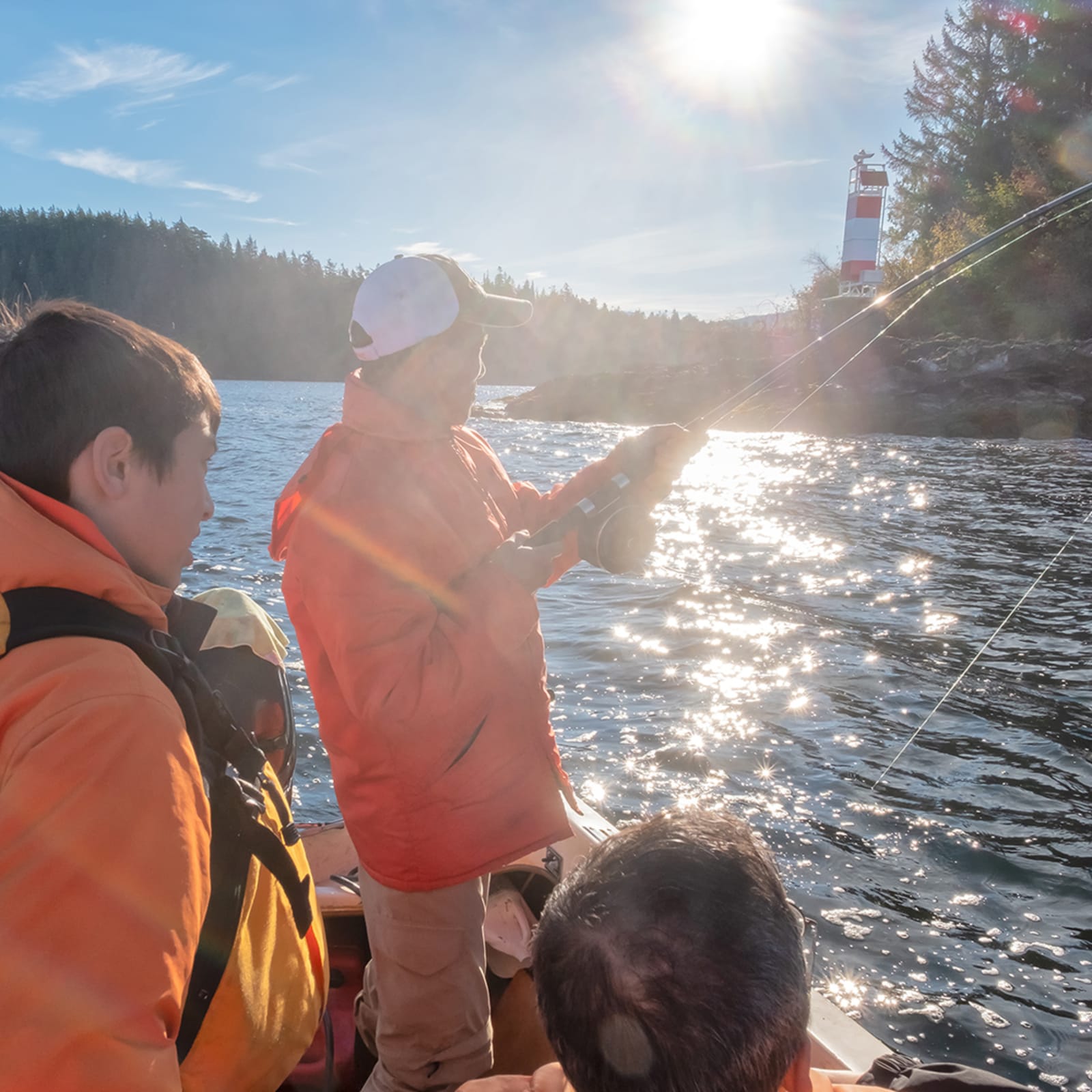 Family out on a lake fishing in Canada