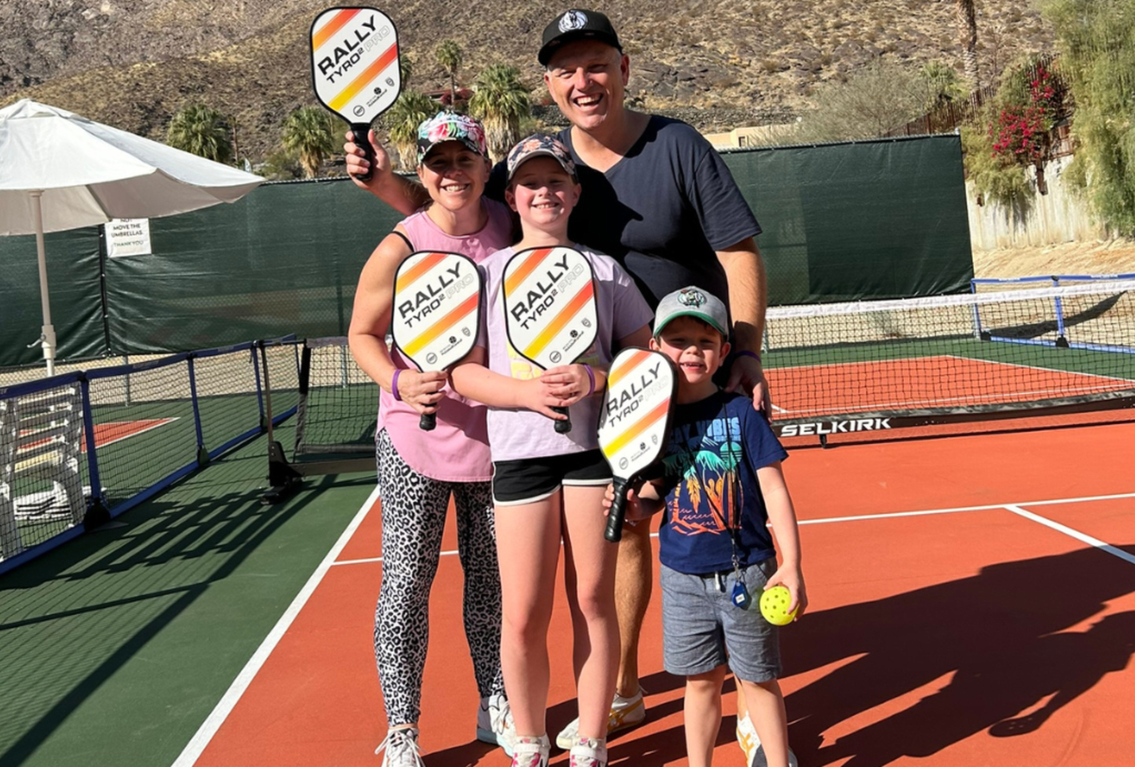 A family get set to play pickleball