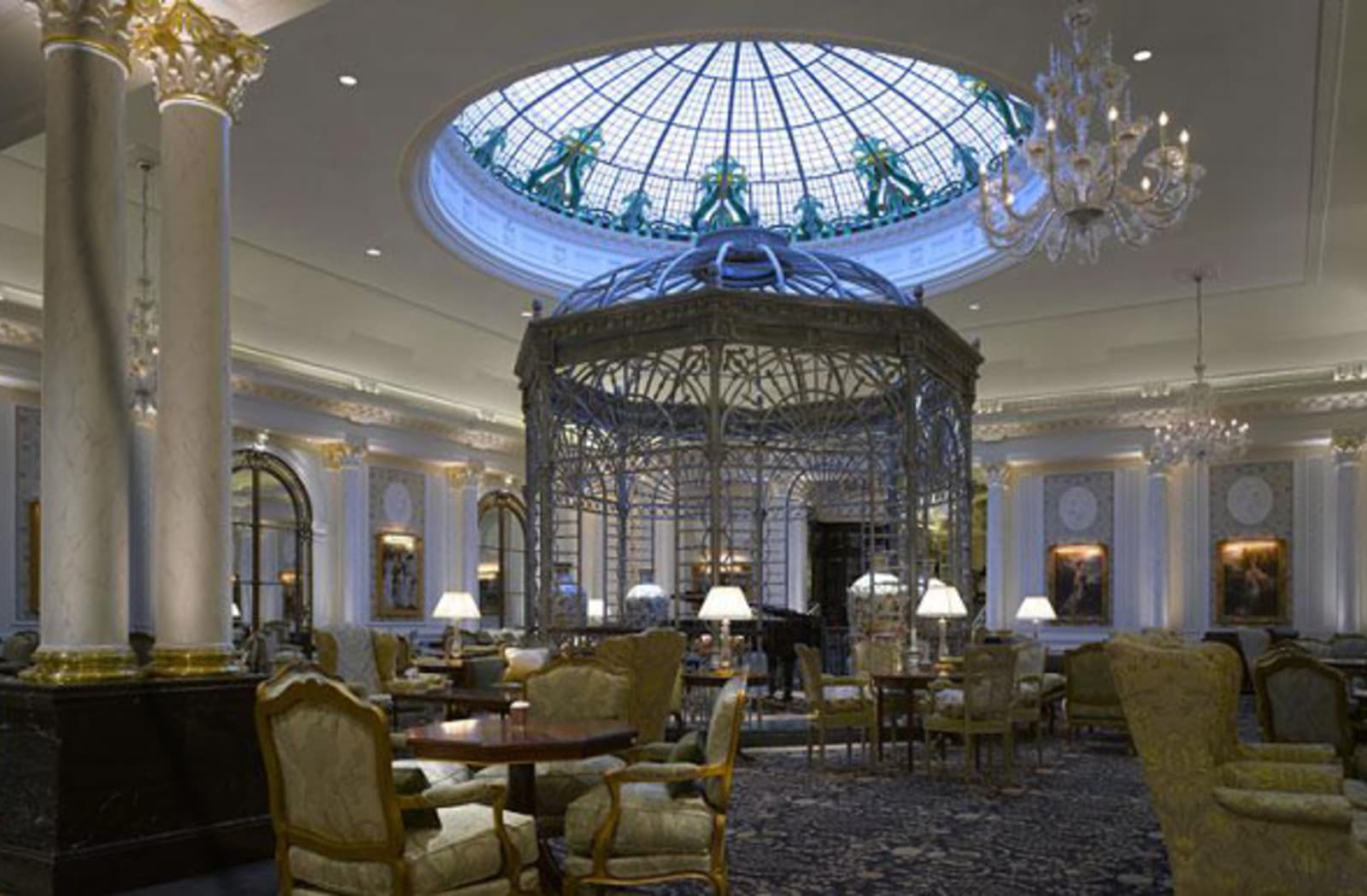 Regal gazebo frame in a high tea room under a glass domed ceiling