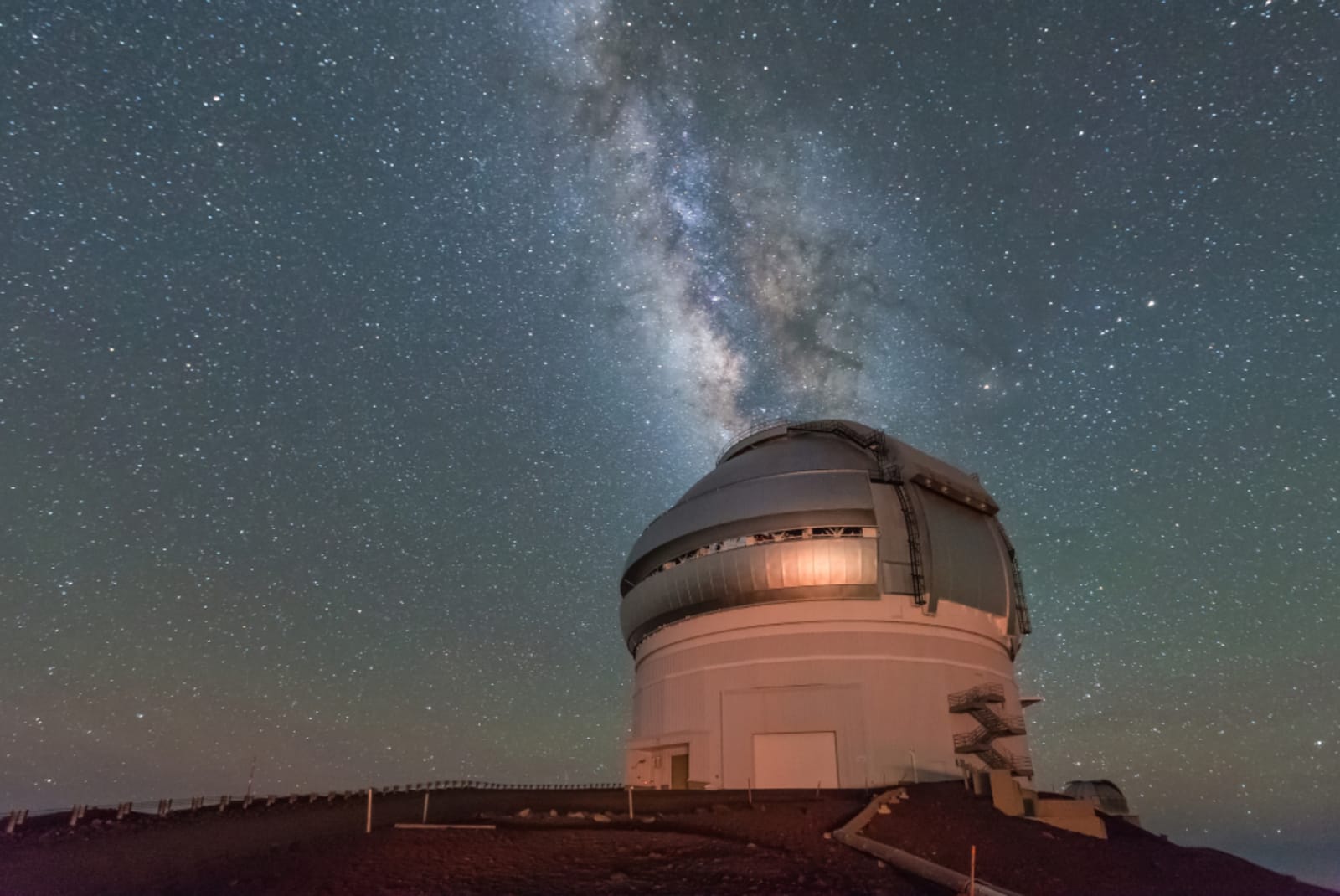 Mauna Kea Observatory with Milky Way and stars, Big Island Hawaii