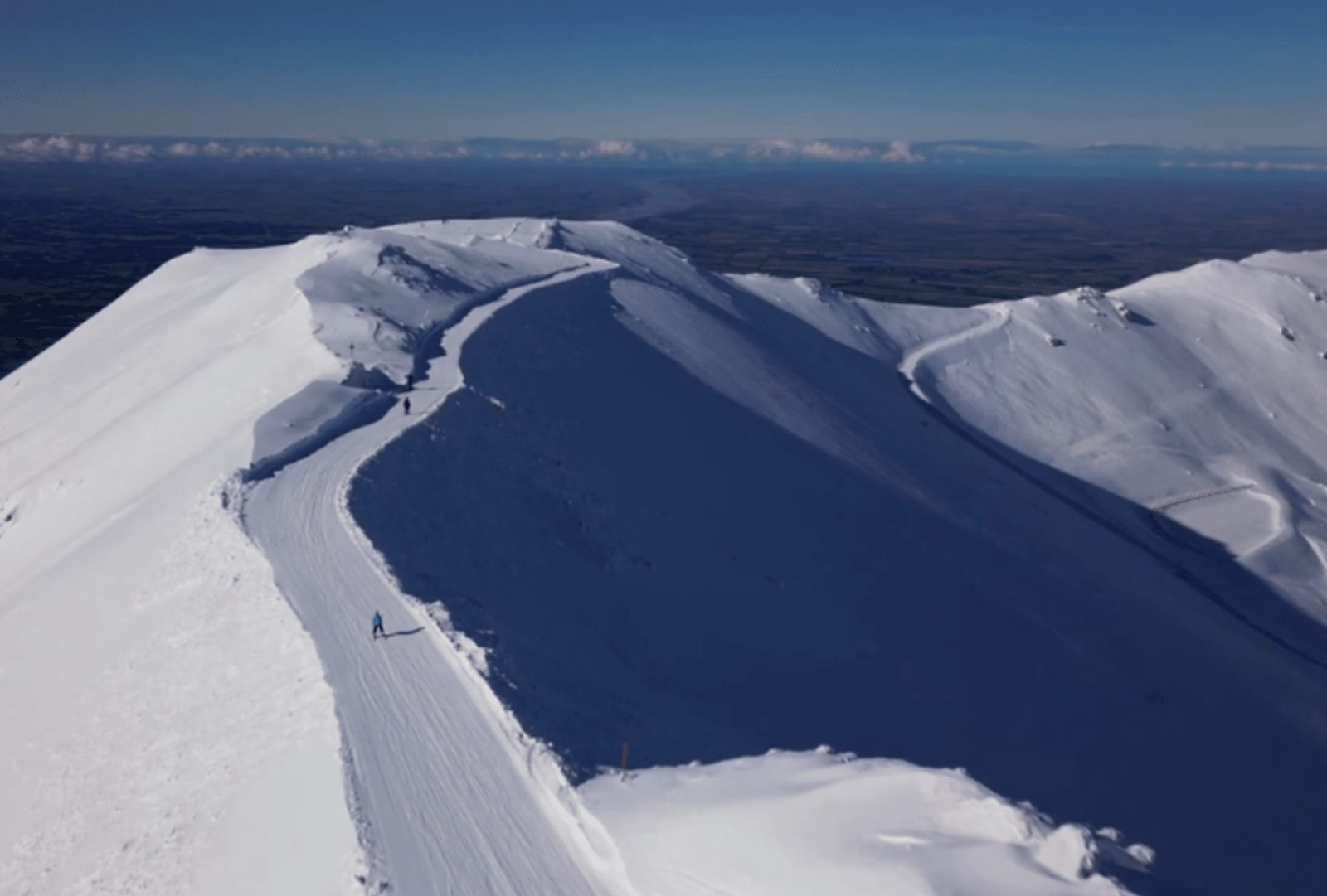 Skiers scaling the heights of Mt Hutt, Canterbury, New Zealand