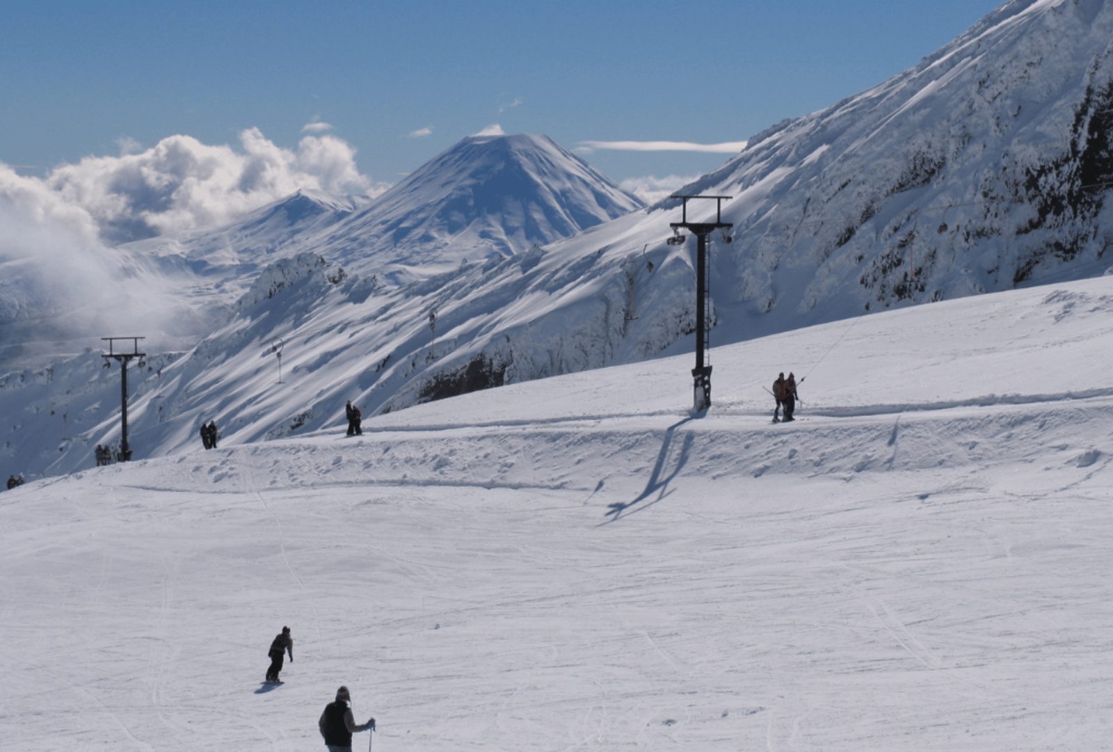 Skiers on the volcanic slopes of Whakapapa ski field
