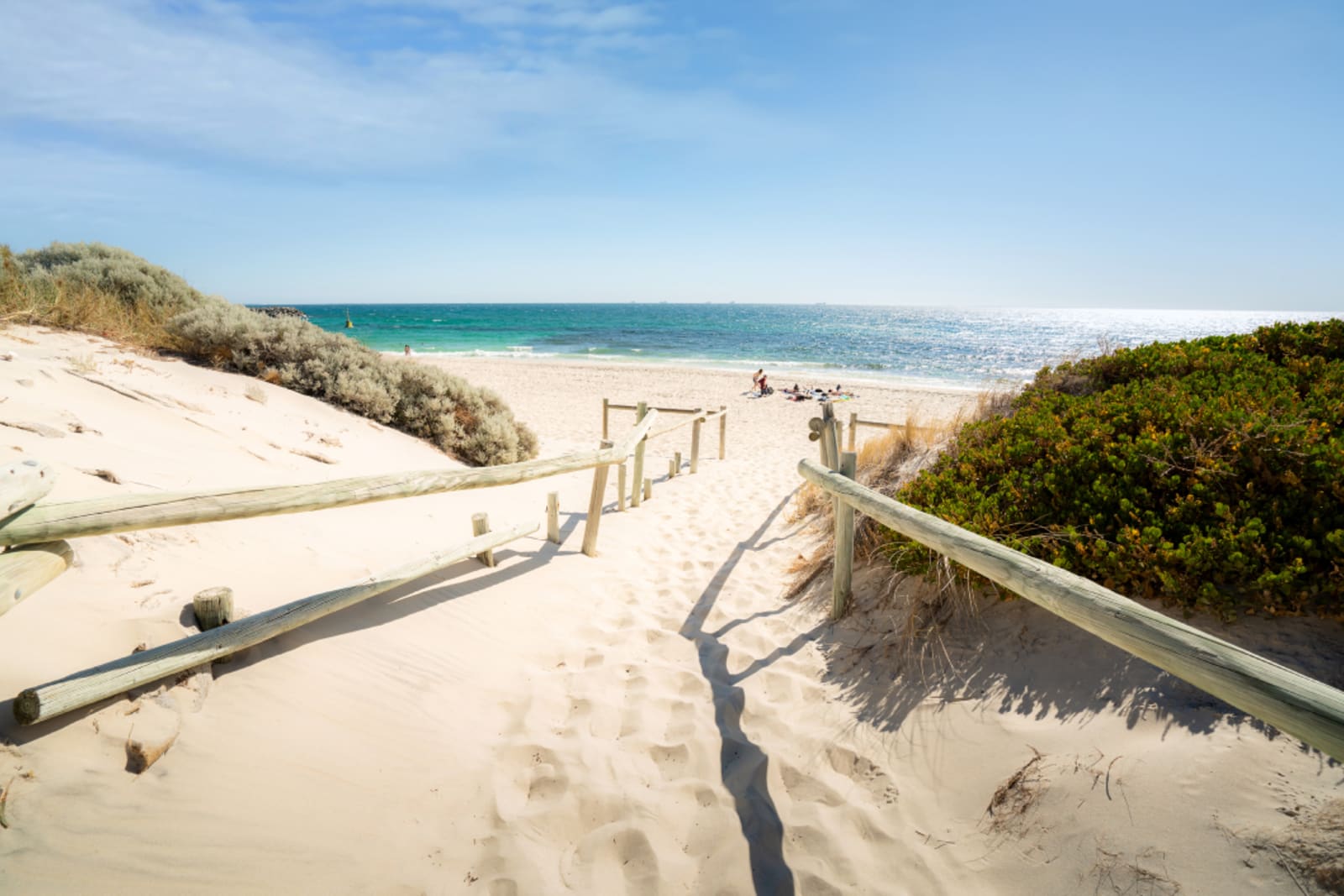 Cottesloe Beach with tourist lying to sunbath and swimming on a summer afternoon in Perth, Western Australia