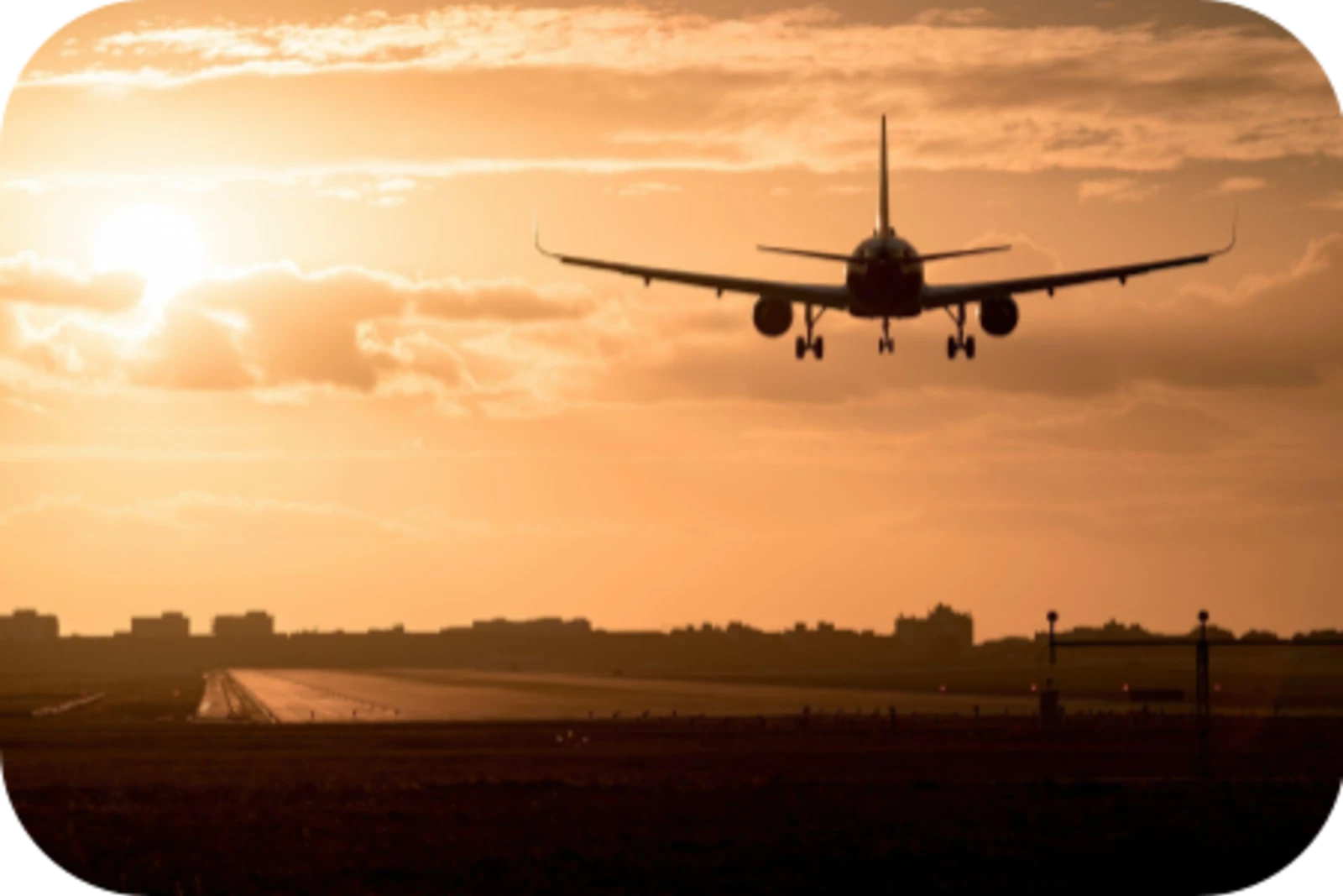 Plane Landing Sunset