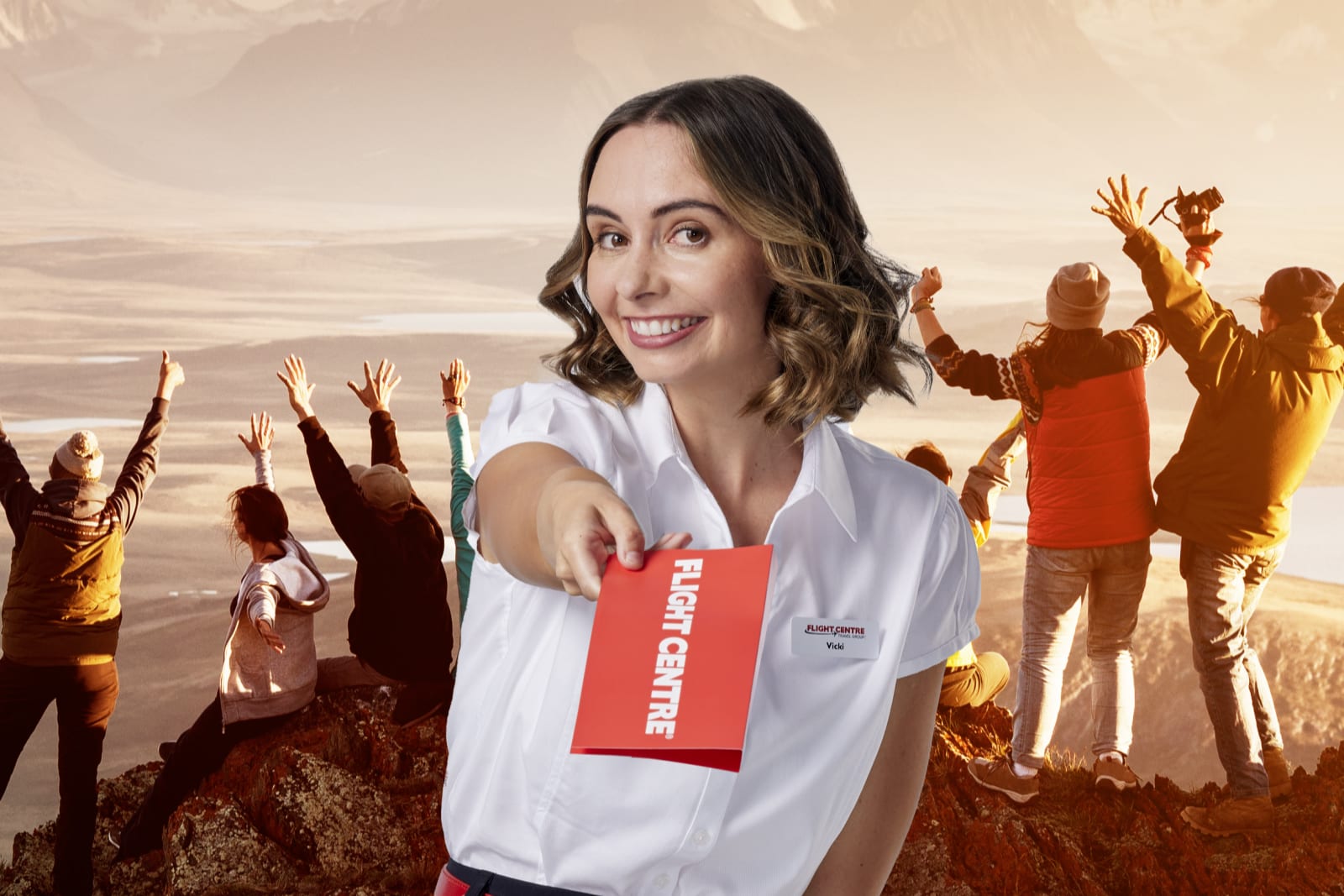 Lady on top of mountain handing out FC documents