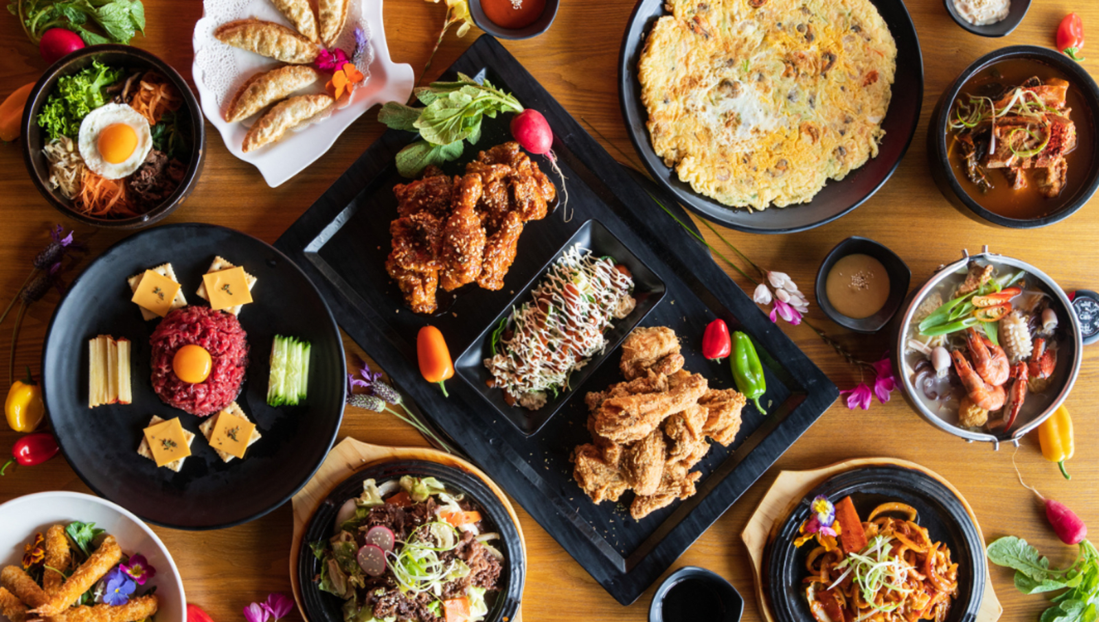 Spread of different korean foods on table