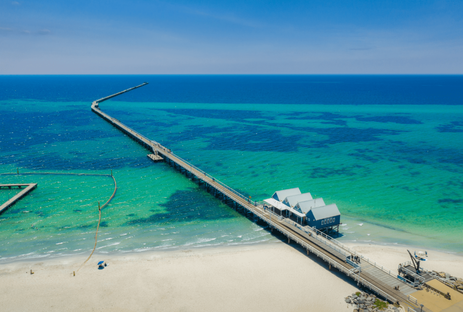 A drone's view of the Busselton jetty extending into the turquoise waters of Geographe Bay