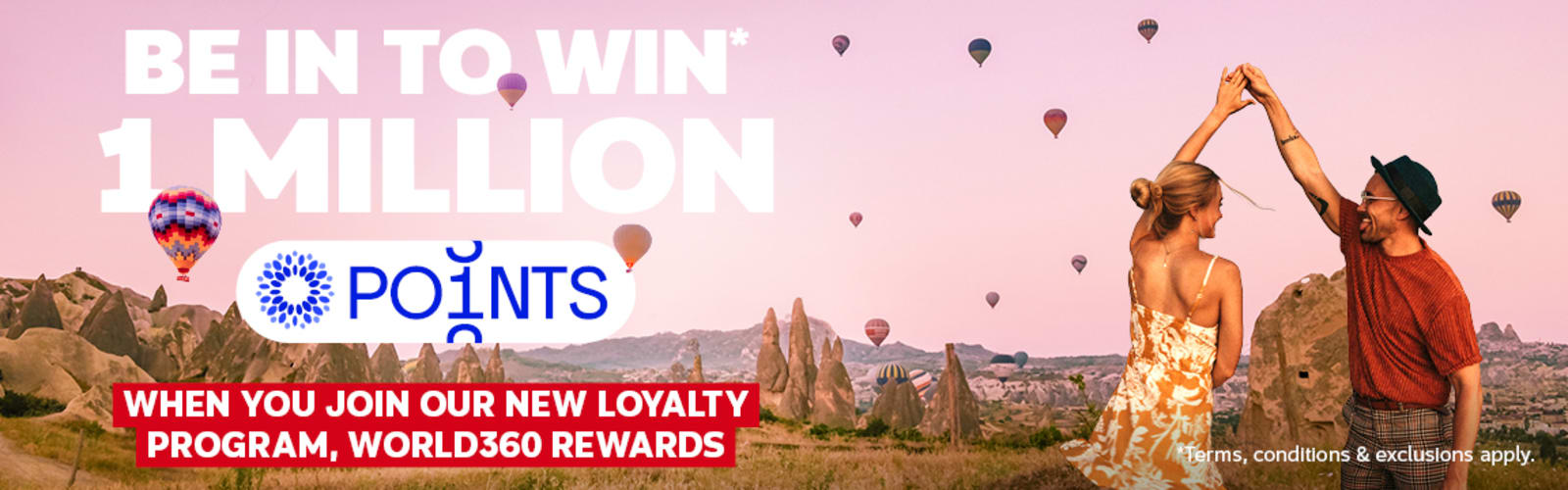 Couple dancing among Cappadocia rock formations with hot air balloons for a chance to win 1 million points by joining World360 Rewards
