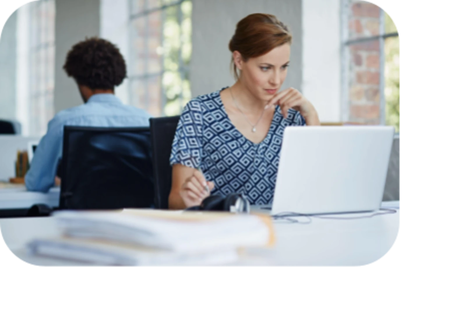 woman using laptop at office