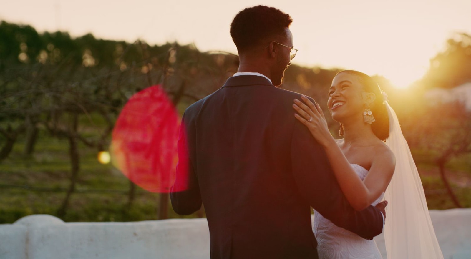 couple holding each other on wedding day