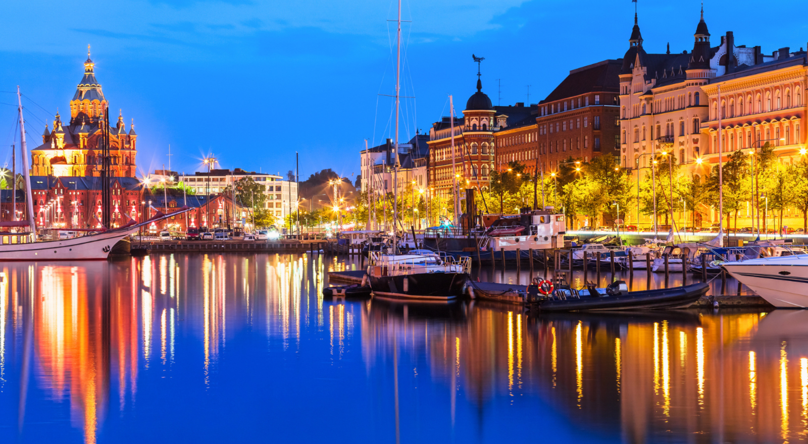 Helsinki town by the water with boats