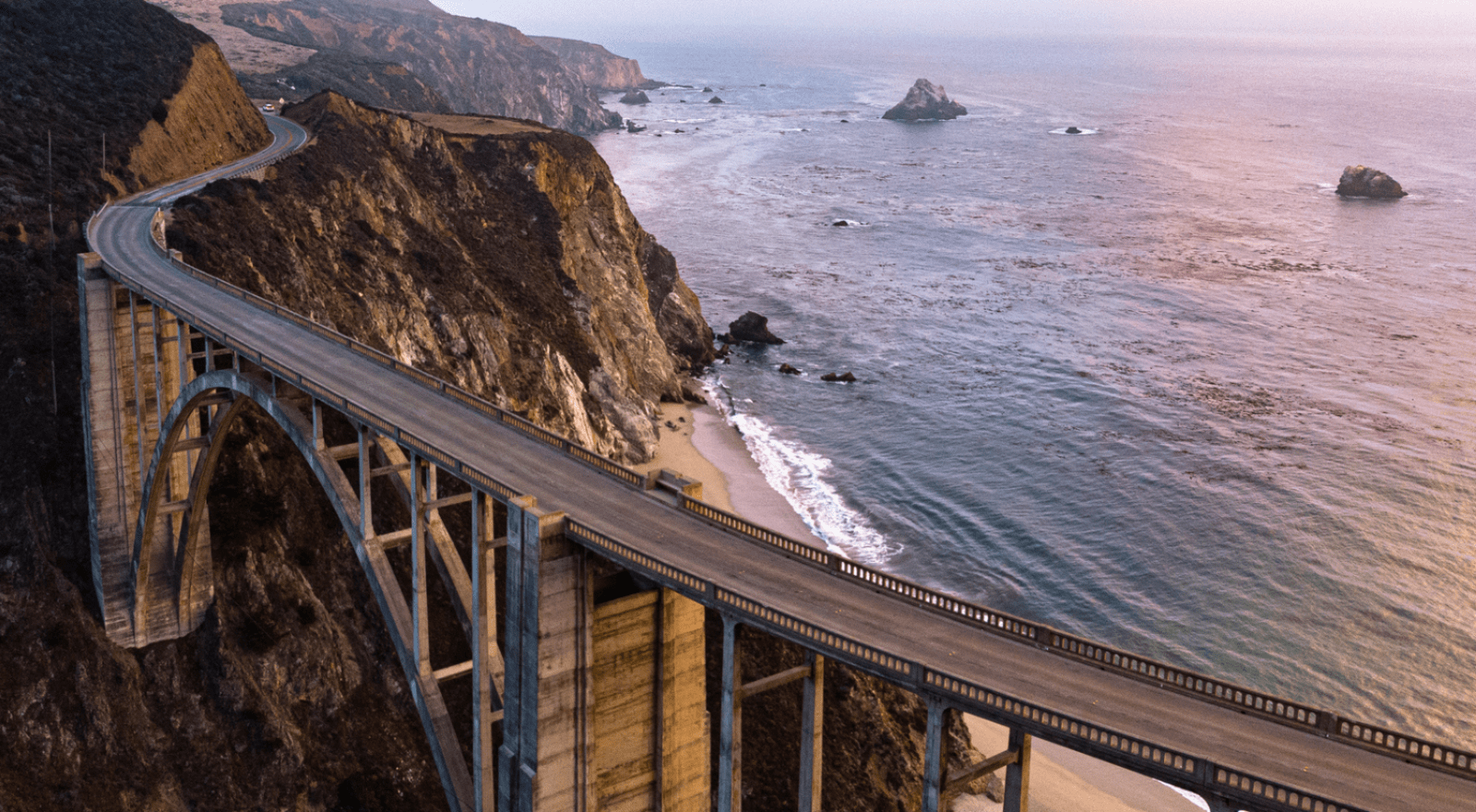 bridge of highway at sunset